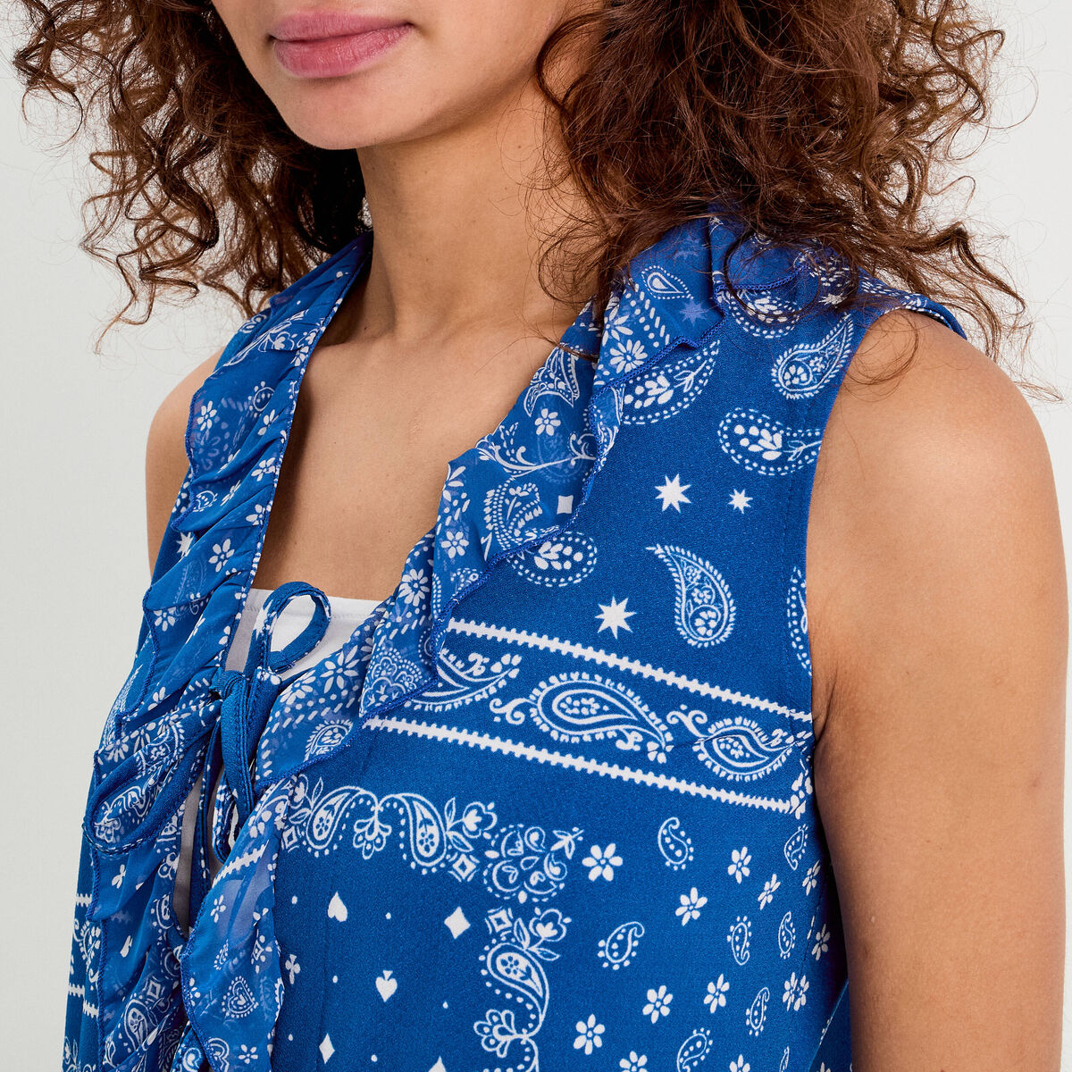 Blouse nou&eacute;e sans manches bleu femme