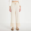 Pantalon large bi-mati&egrave;re pliss&eacute; ecru femme