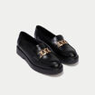 Mocassins avec bijou noir femme
