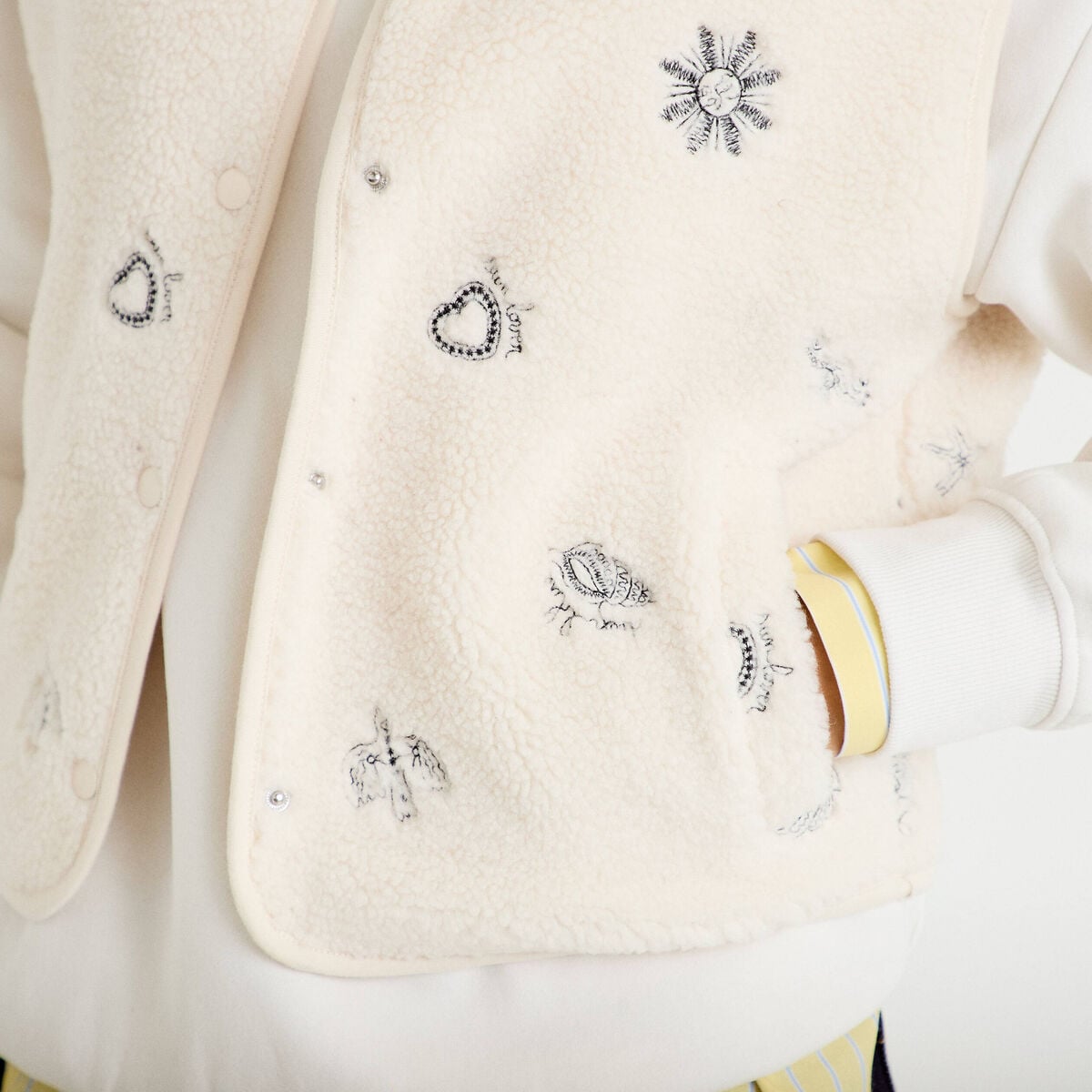 Gilet sans manches effet polaire col v ecru femme