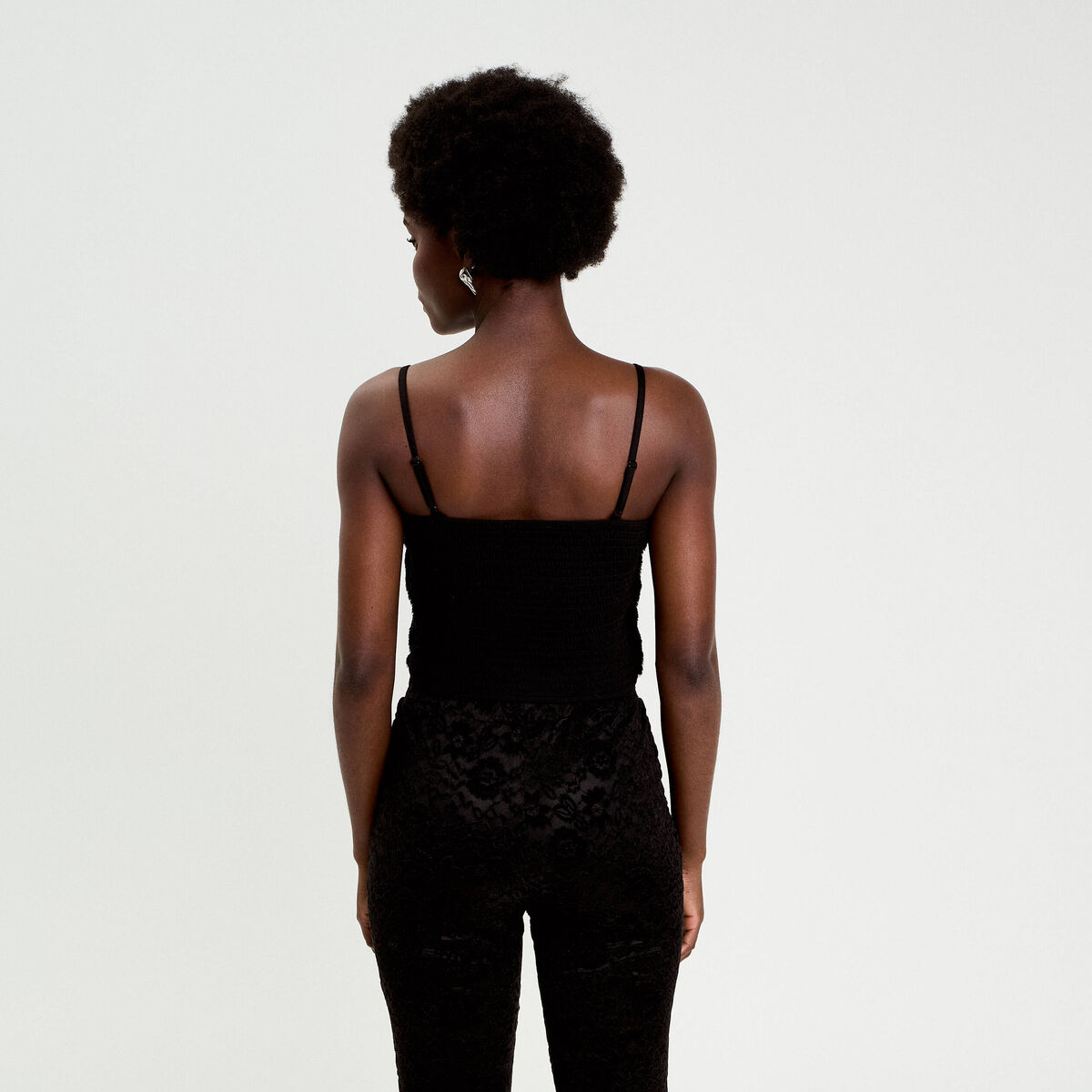 D&eacute;bardeur fausse fourrure noir femme