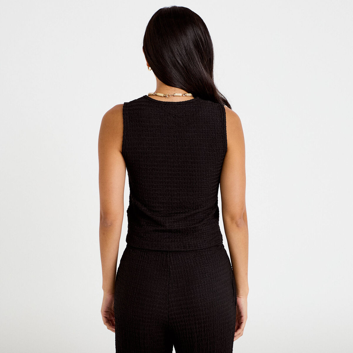 Gilet cintr&eacute; sans manches col v noir femme