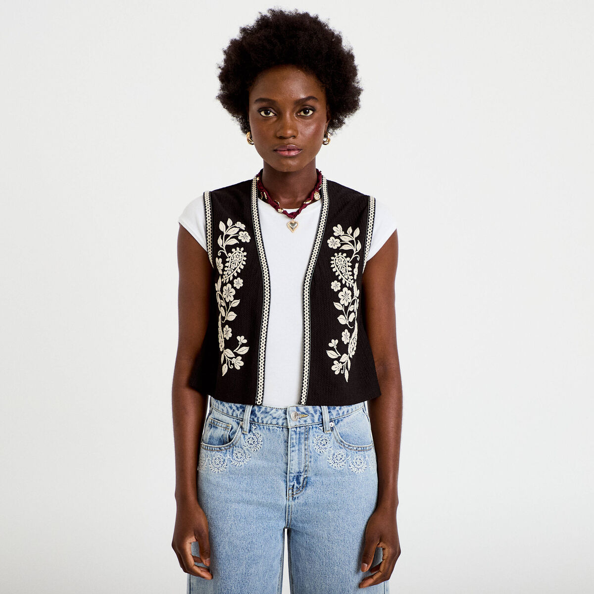 Gilet droit court sans manches noir femme