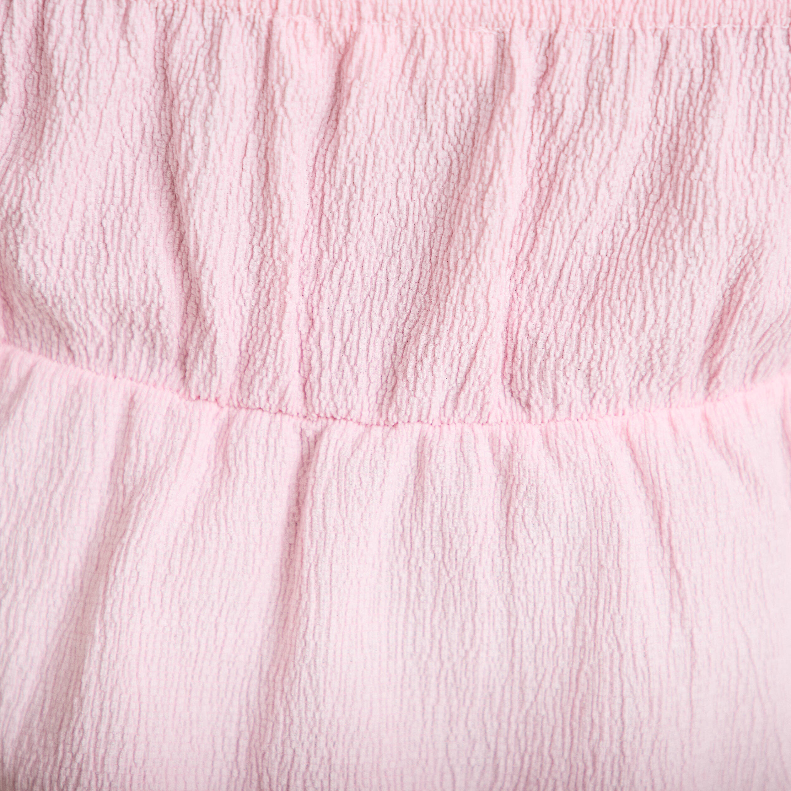 D&eacute;bardeur d&eacute;tail bijou rose clair femme
