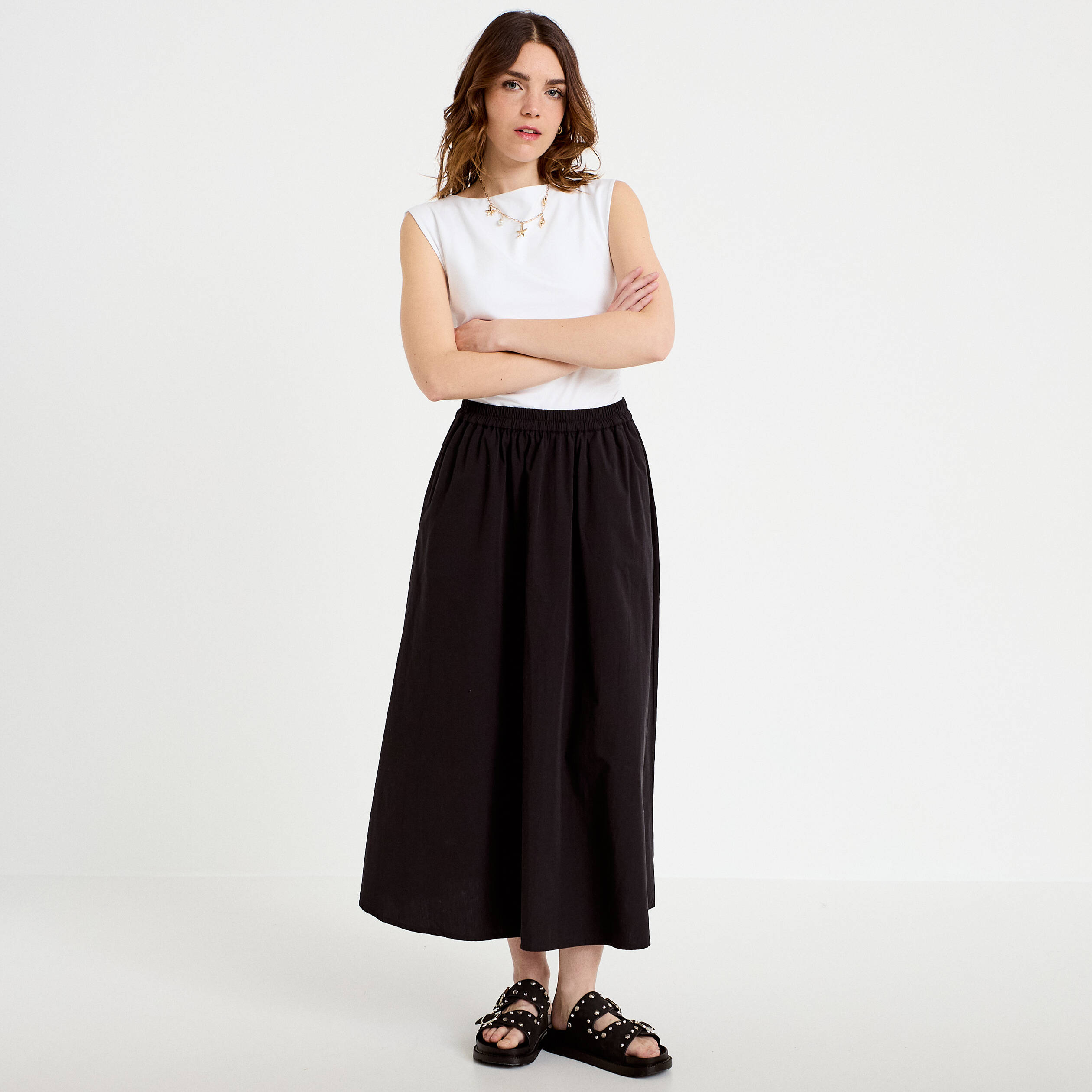Jupon &eacute;vas&eacute; long noir femme