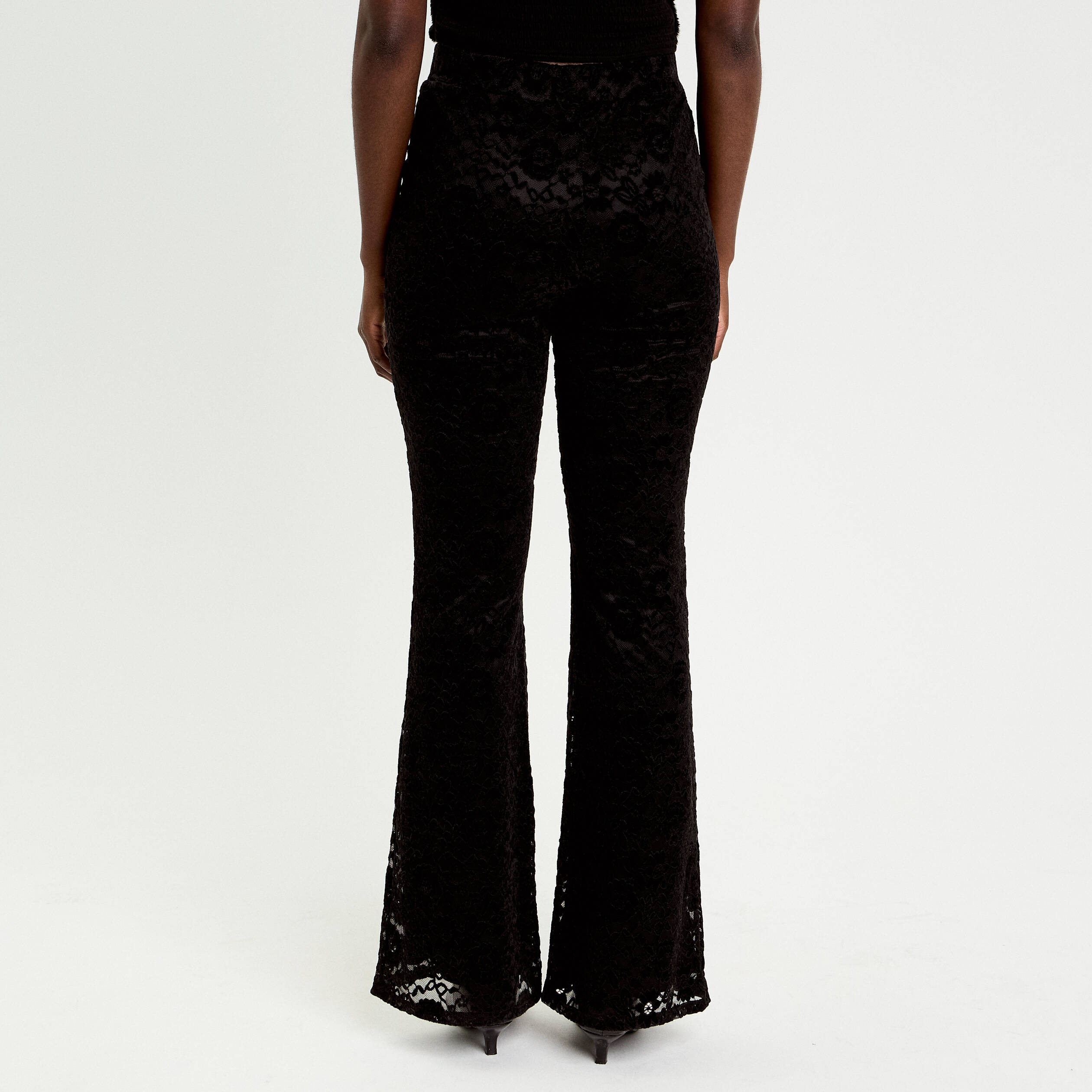 Pantalon bootcut effet dentelle noir femme