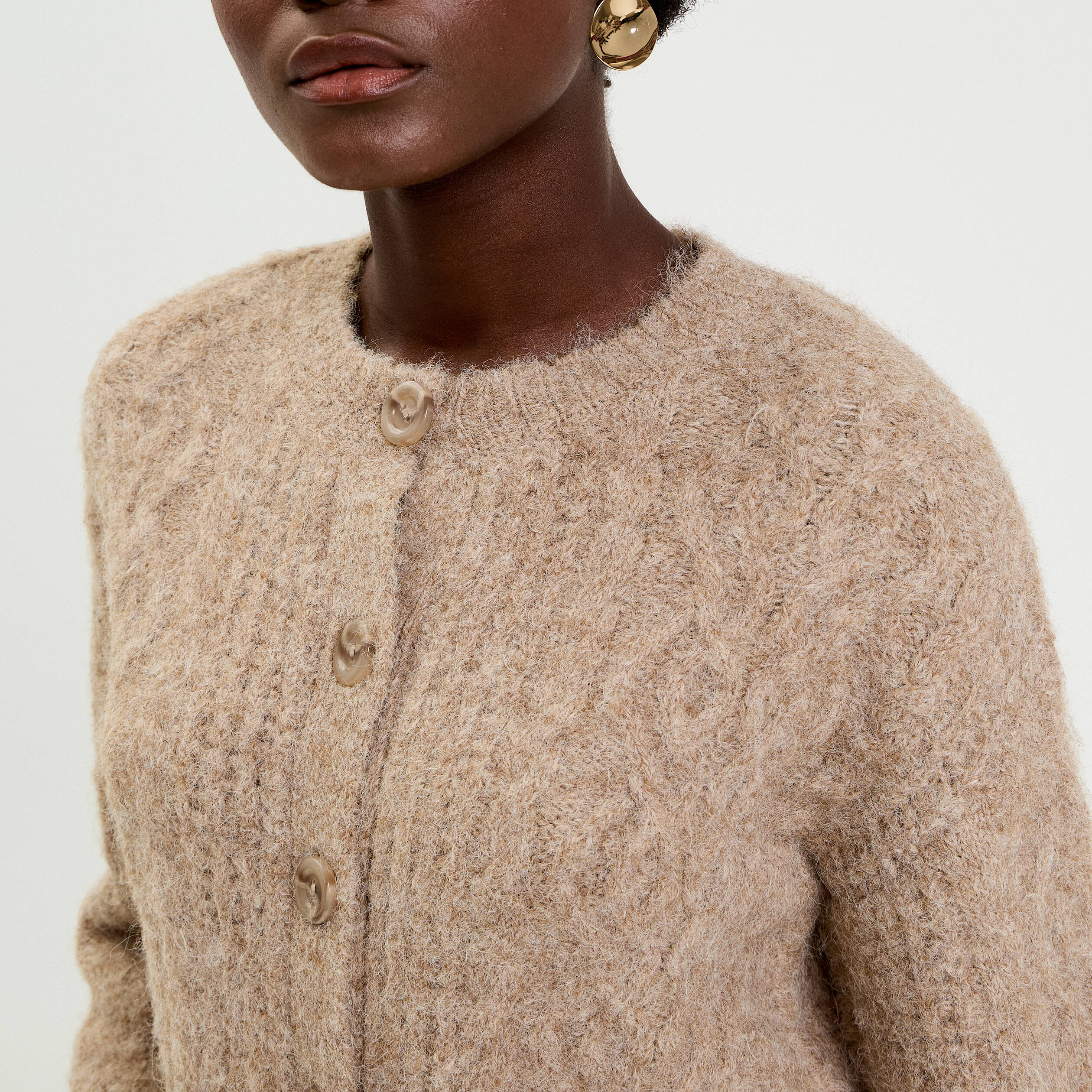 Gilet torsad&eacute; col rond beige femme