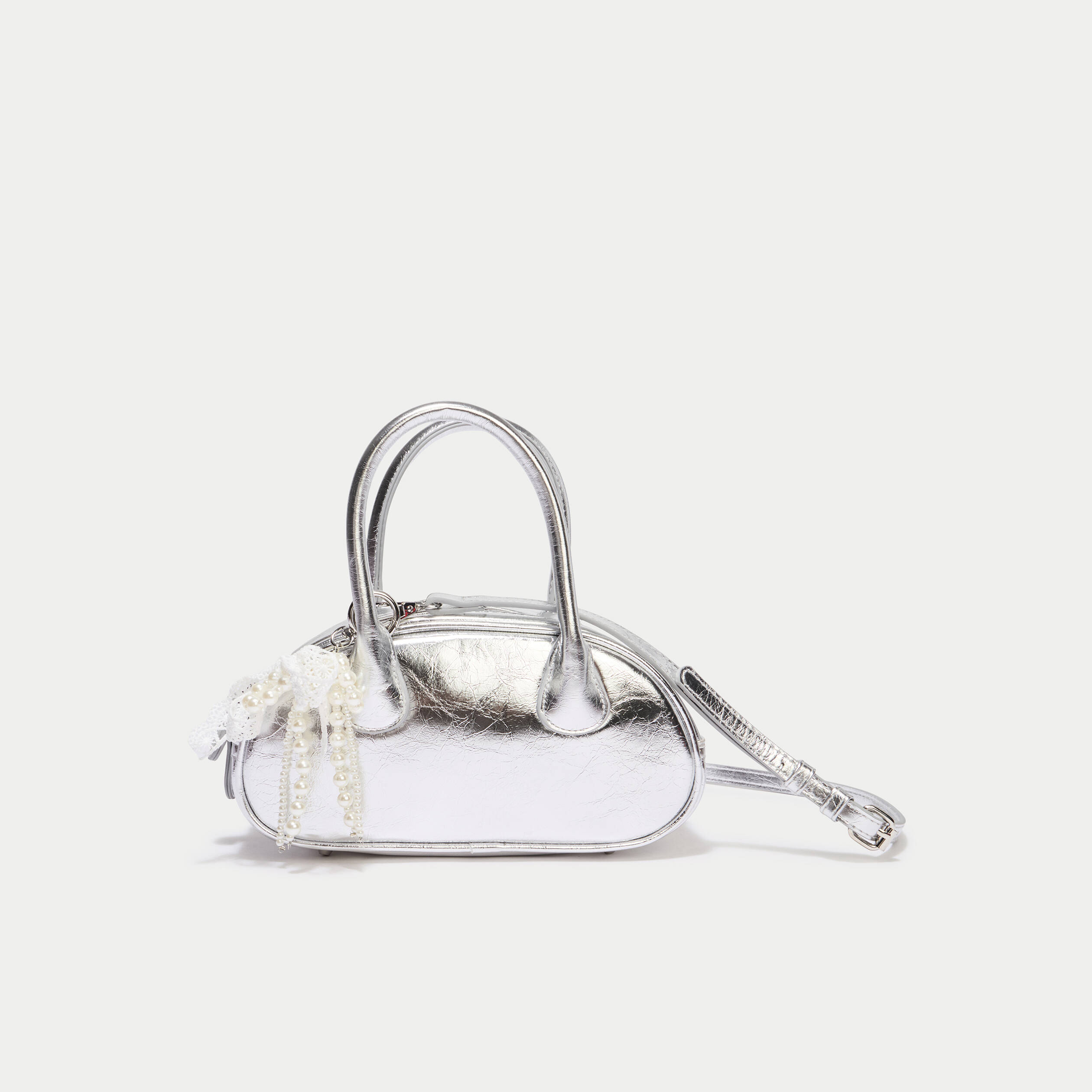 Sac port&eacute; main couleur argent femme