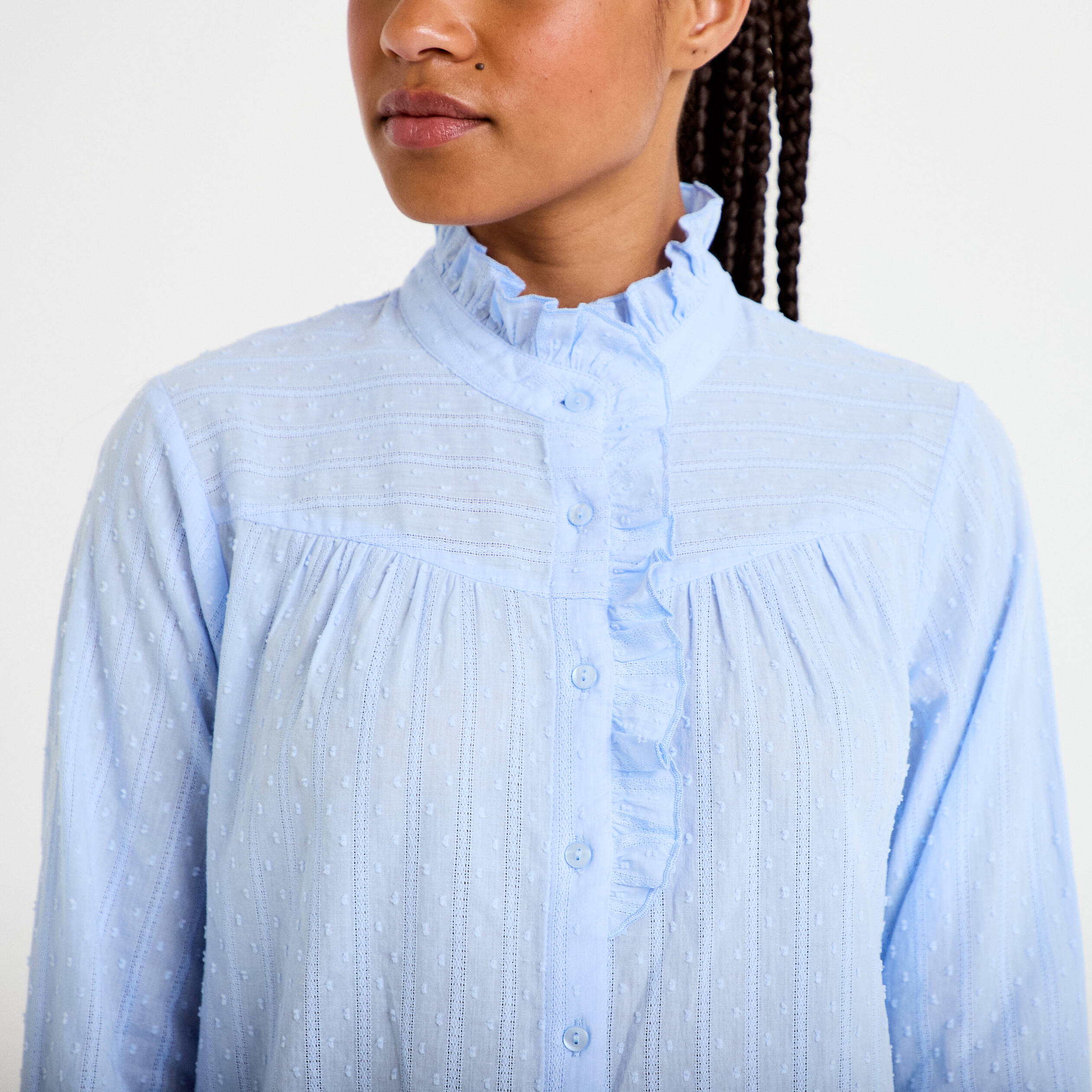 Chemise col montant manches longues bleu clair femme