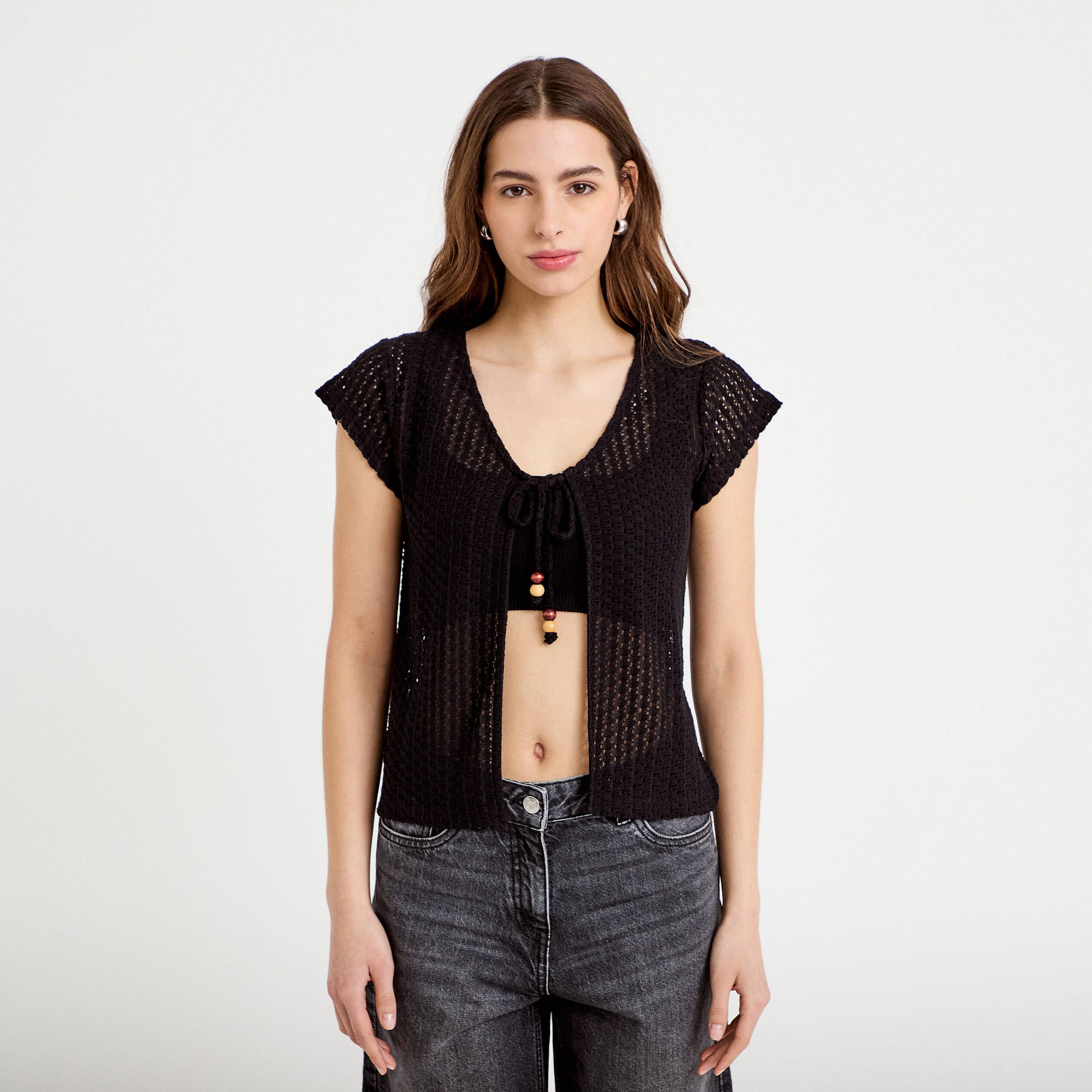 Gilet manches courtes aspect dentelle noir femme