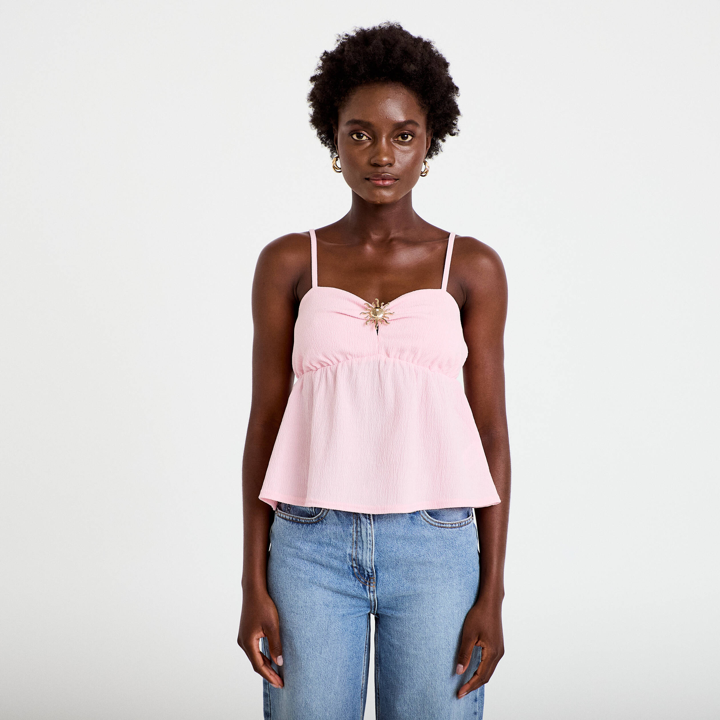 D&eacute;bardeur d&eacute;tail bijou rose clair femme