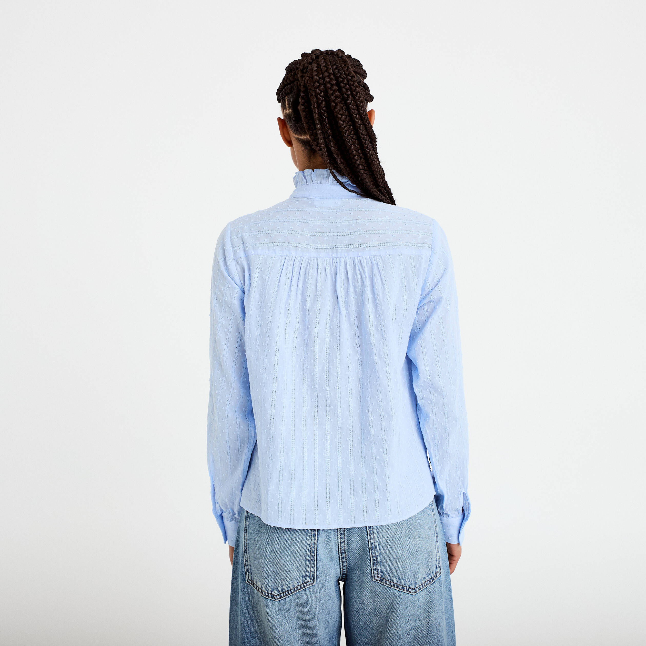 Chemise col montant manches longues bleu clair femme
