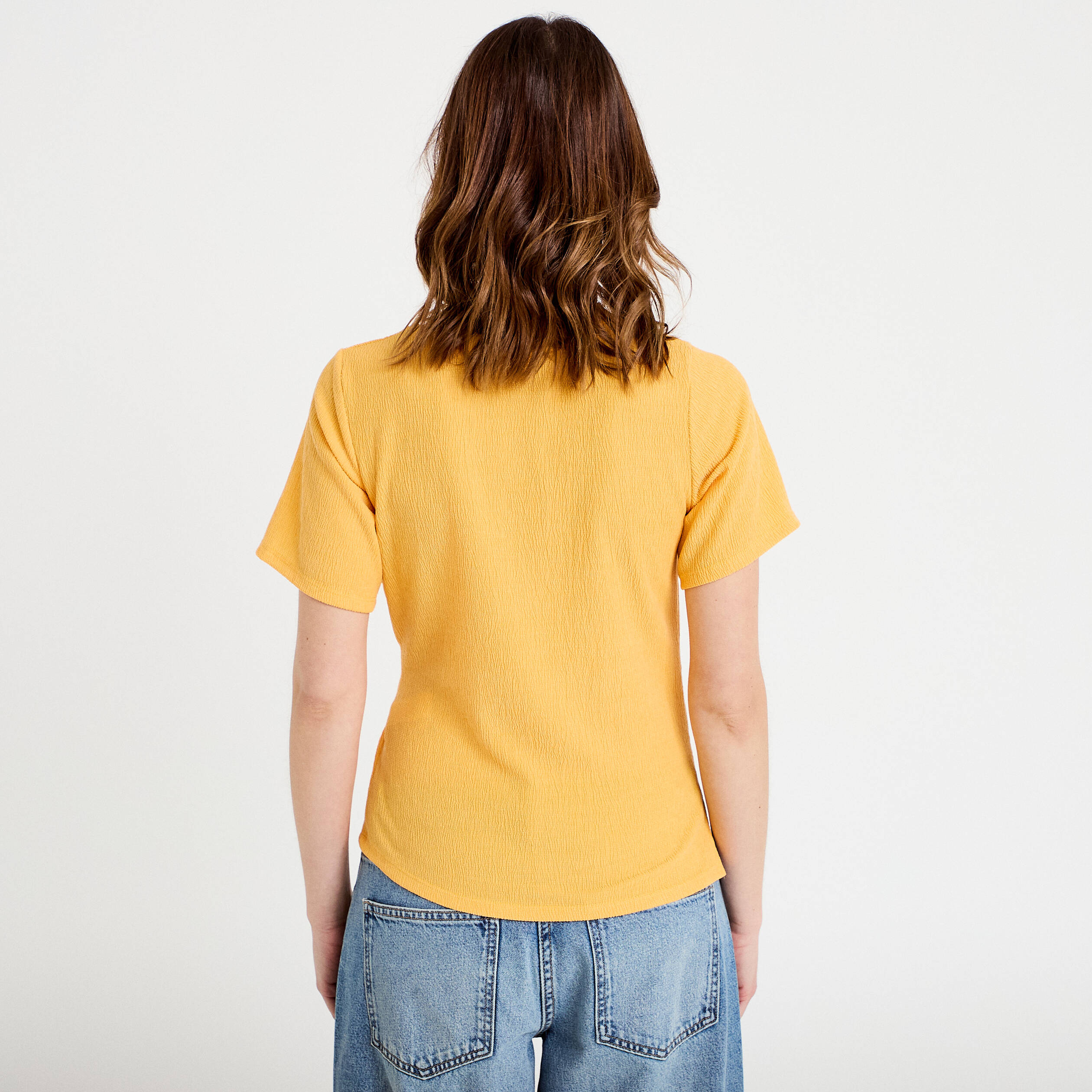 T-shirt cintr&eacute; col rond manches courtes orange clair femme