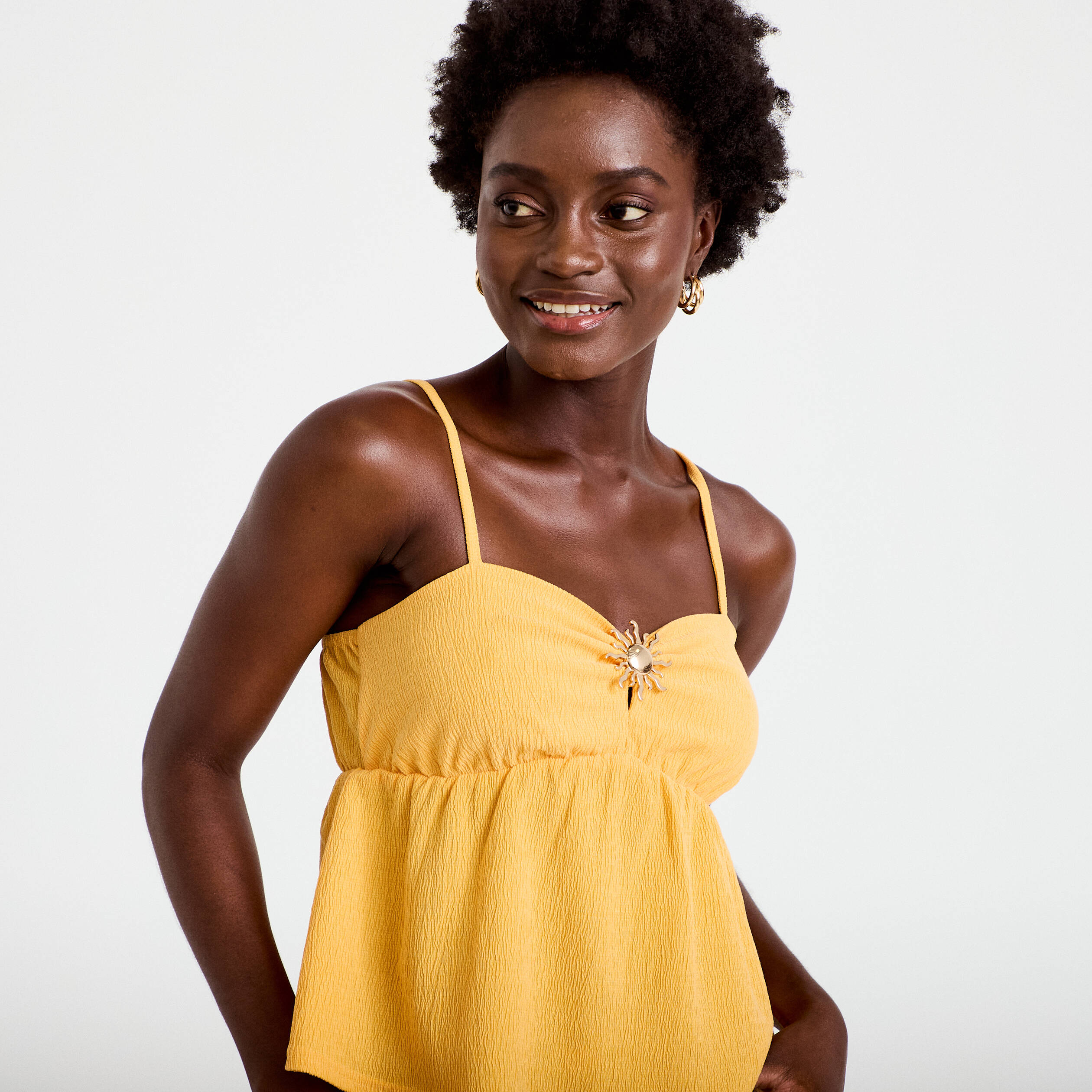 D&eacute;bardeur d&eacute;tail bijou orange clair femme