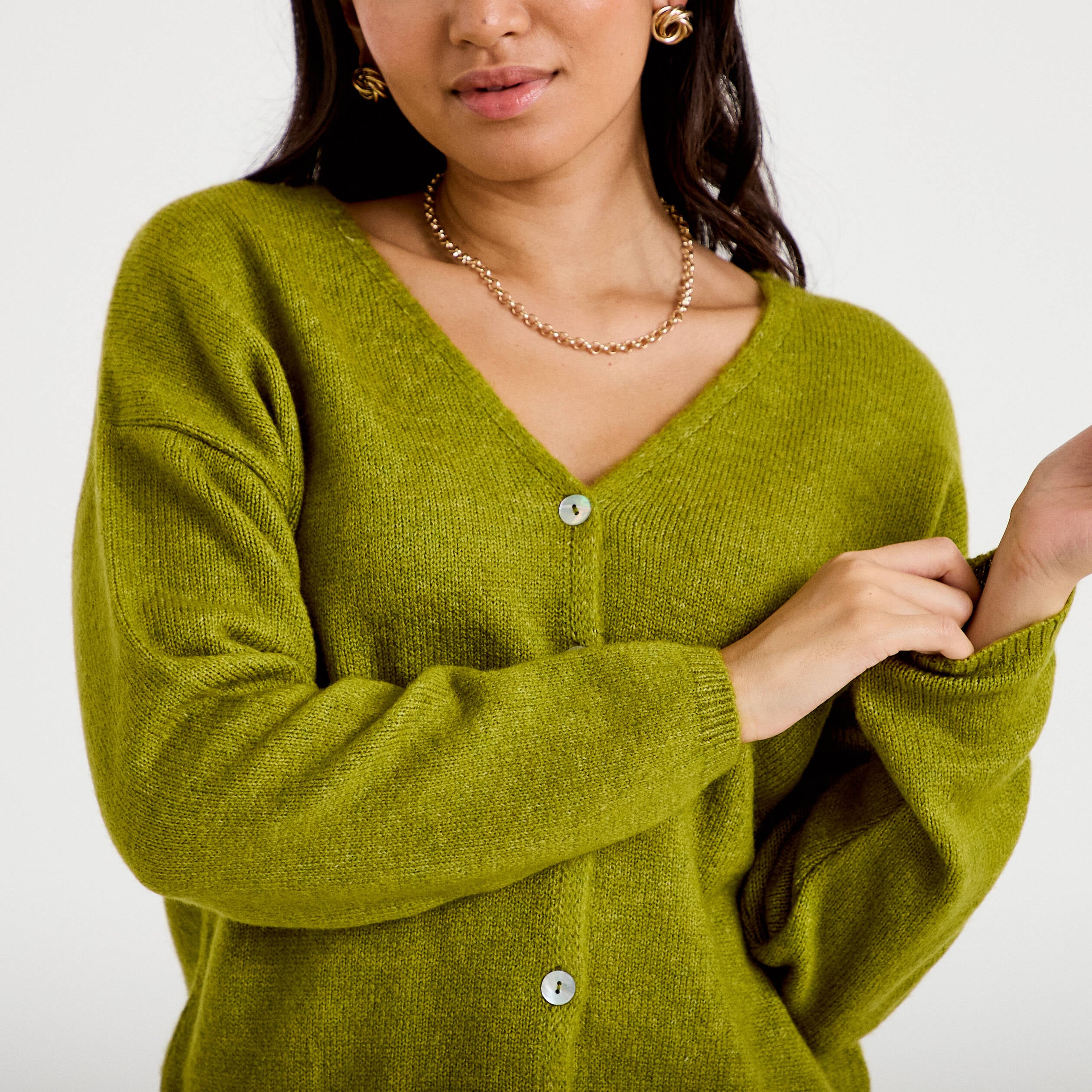 Gilet boutonn&eacute; avec col en V vert fonc&eacute; femme