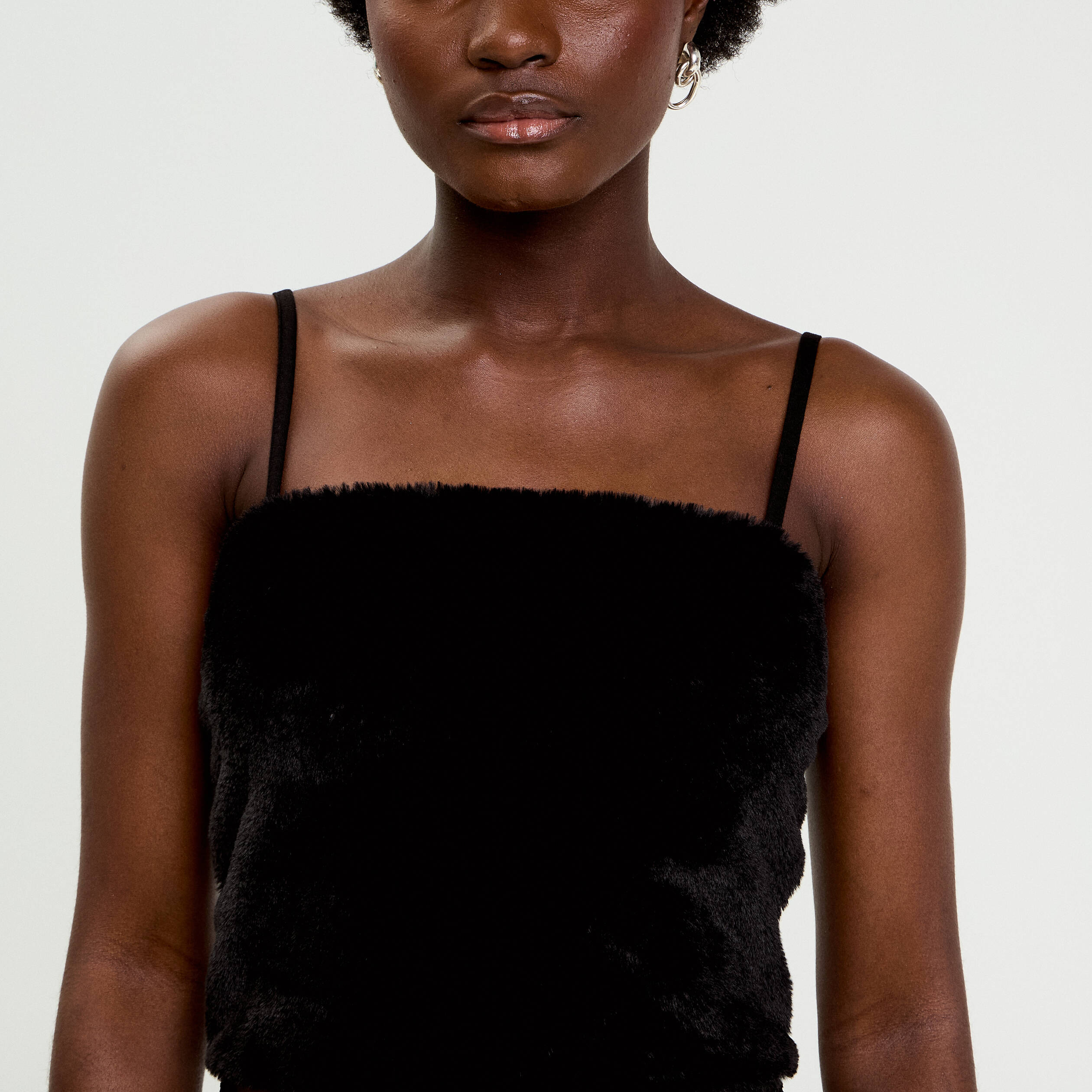 D&eacute;bardeur fausse fourrure noir femme