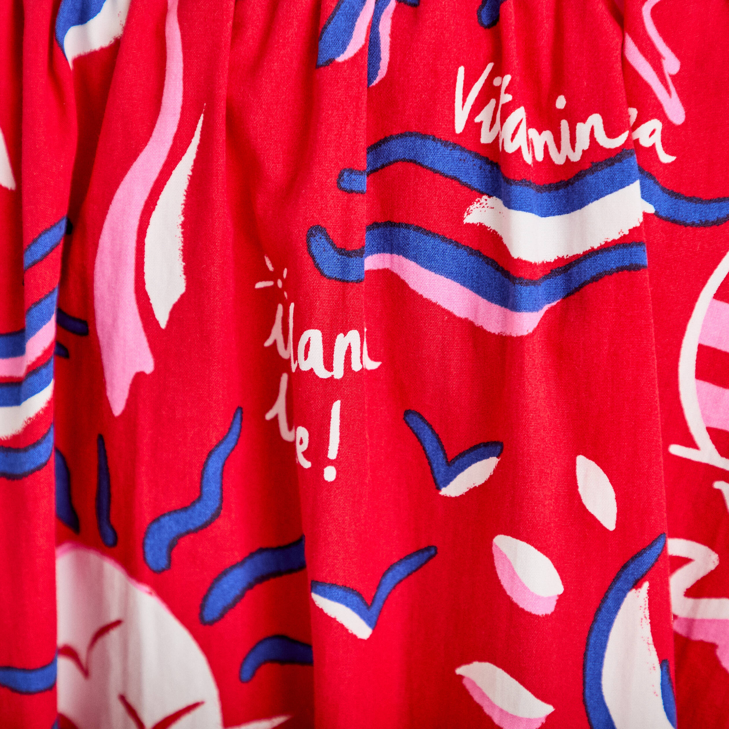 Jupon &eacute;vas&eacute; long rouge femme