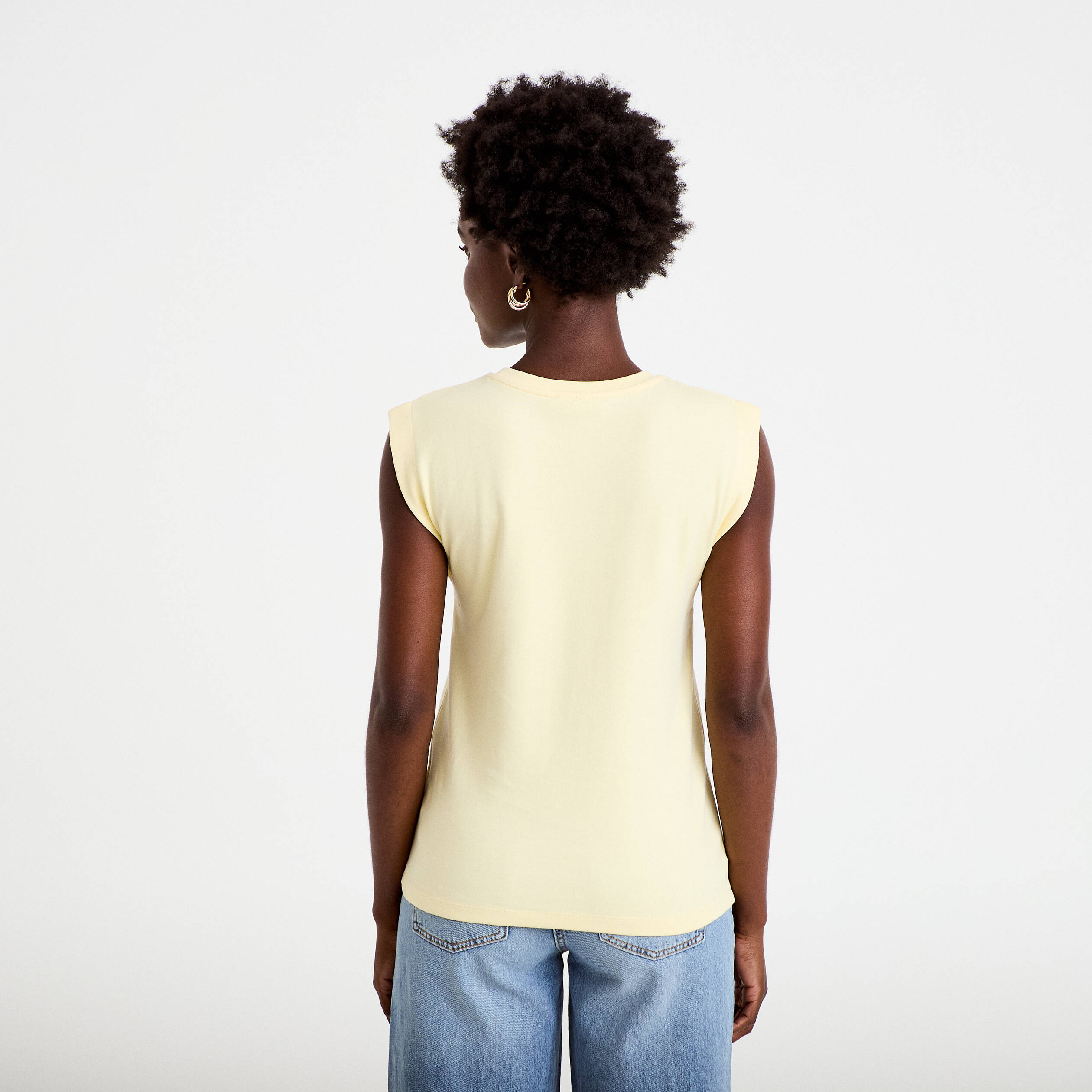 T-shirt col rond sans manches jaune pastel femme