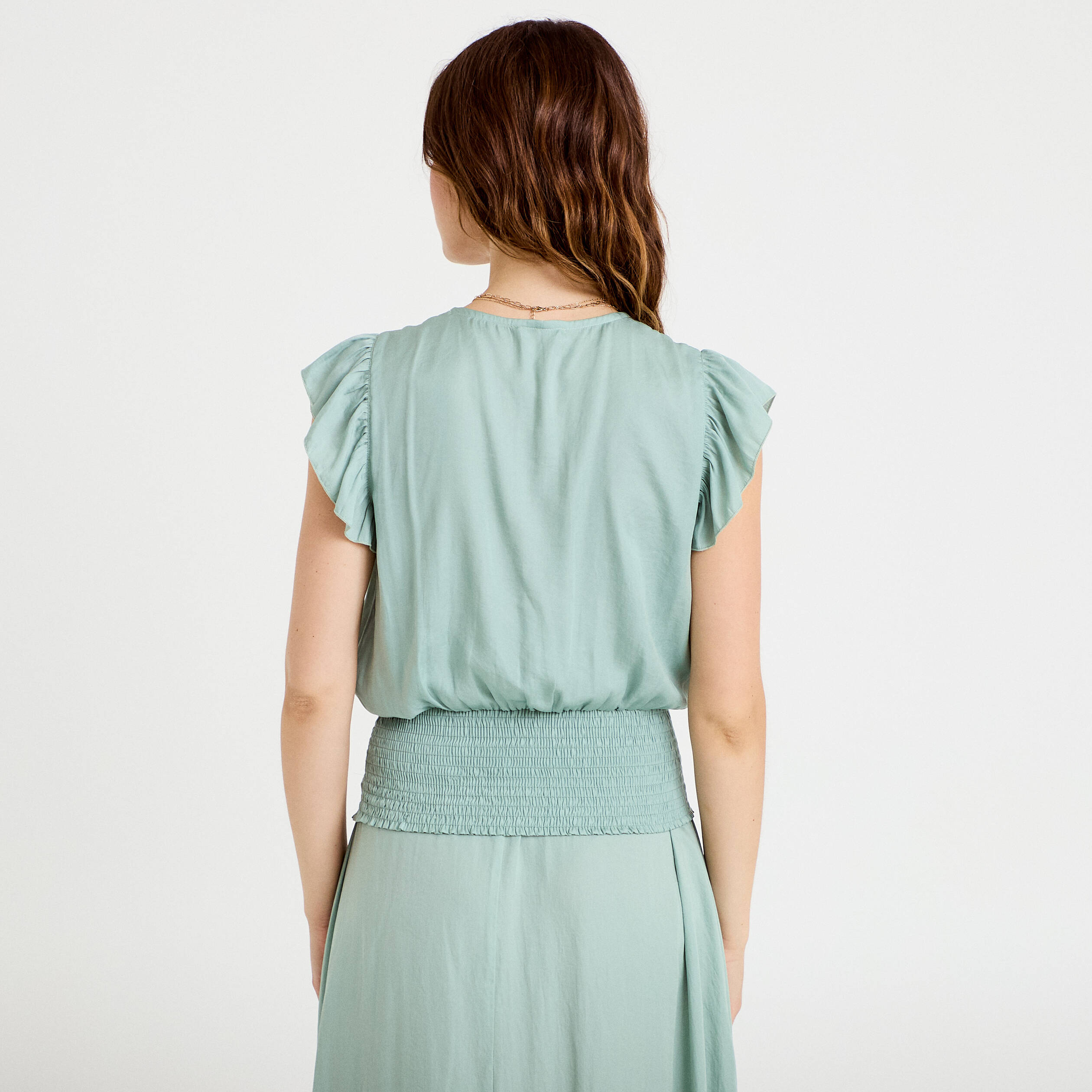 Blouse cintr&eacute;e col v manches courtes vert pastel femme
