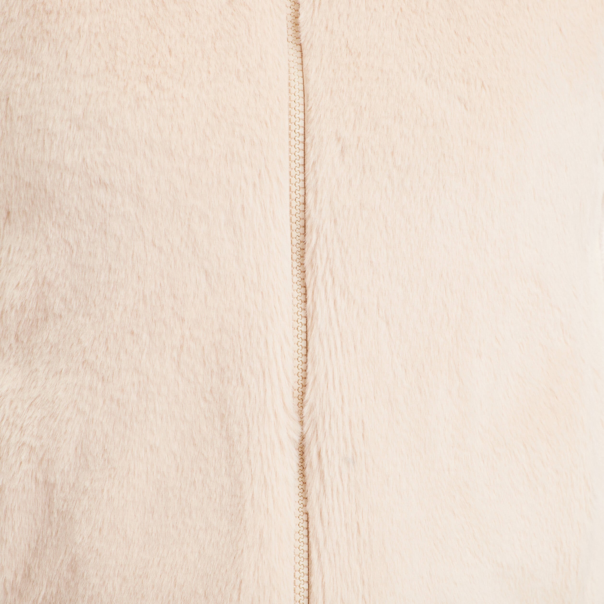 Veste courte ajust&eacute;e sans manches ivoire femme