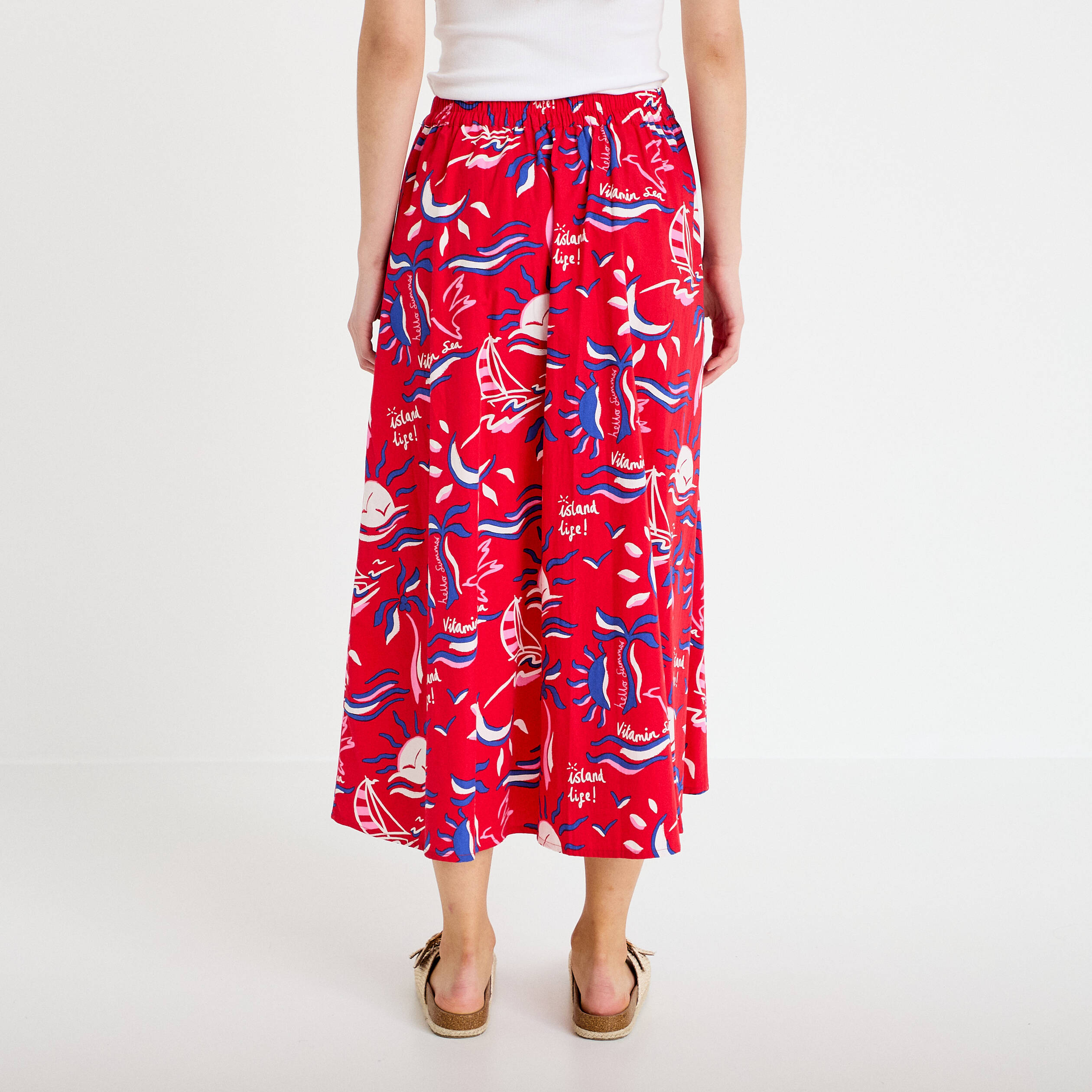 Jupon &eacute;vas&eacute; long rouge femme