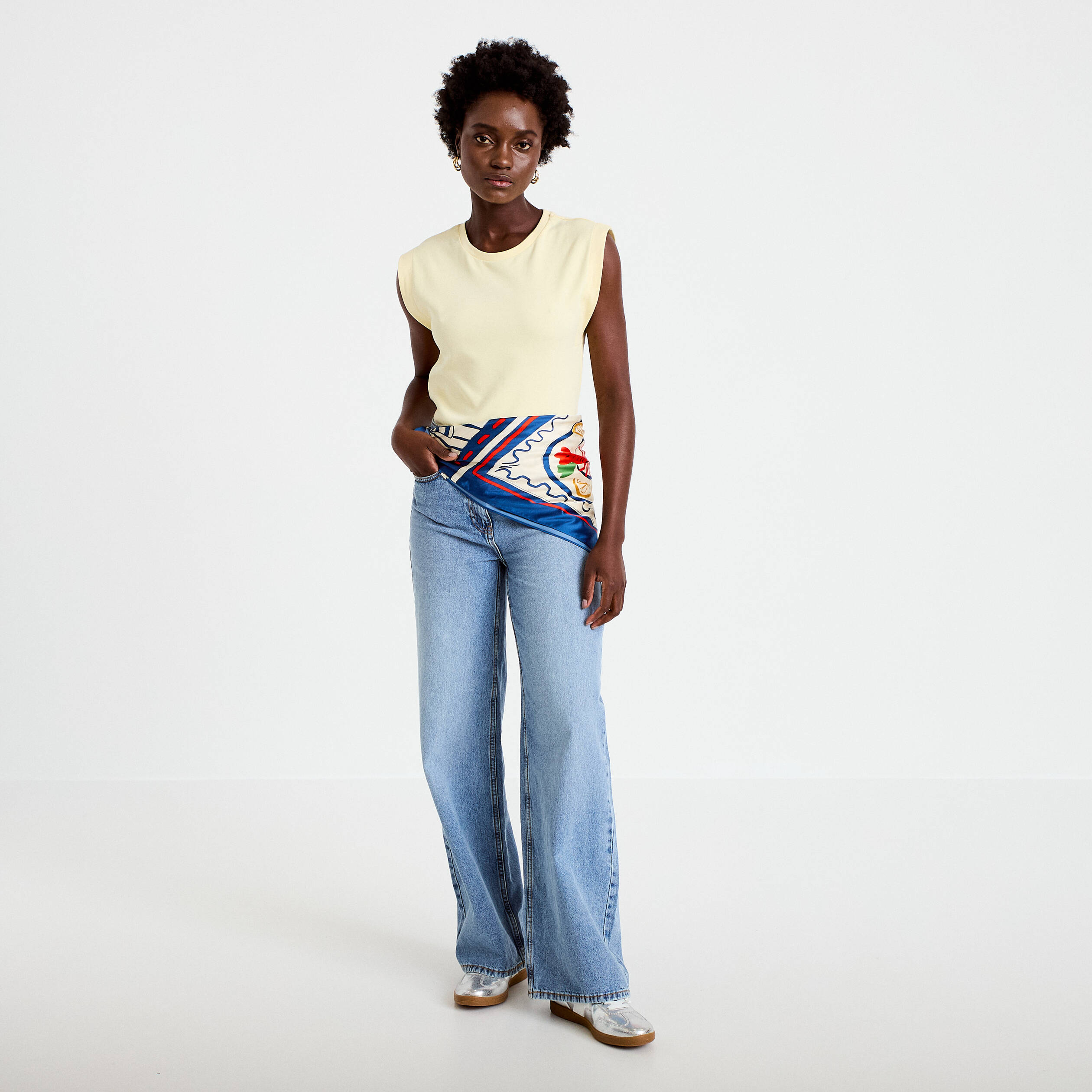 T-shirt col rond sans manches jaune pastel femme