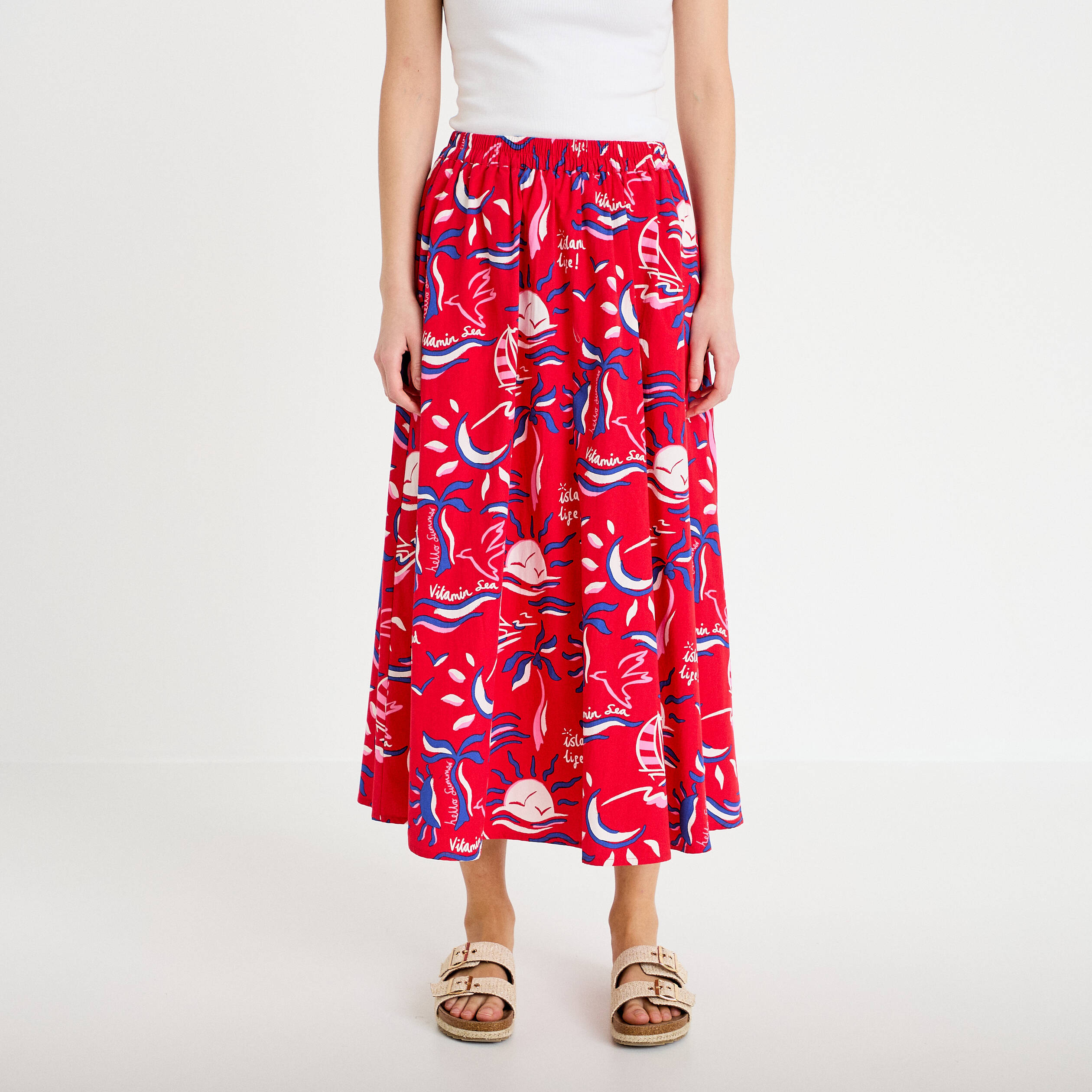 Jupon &eacute;vas&eacute; long rouge femme