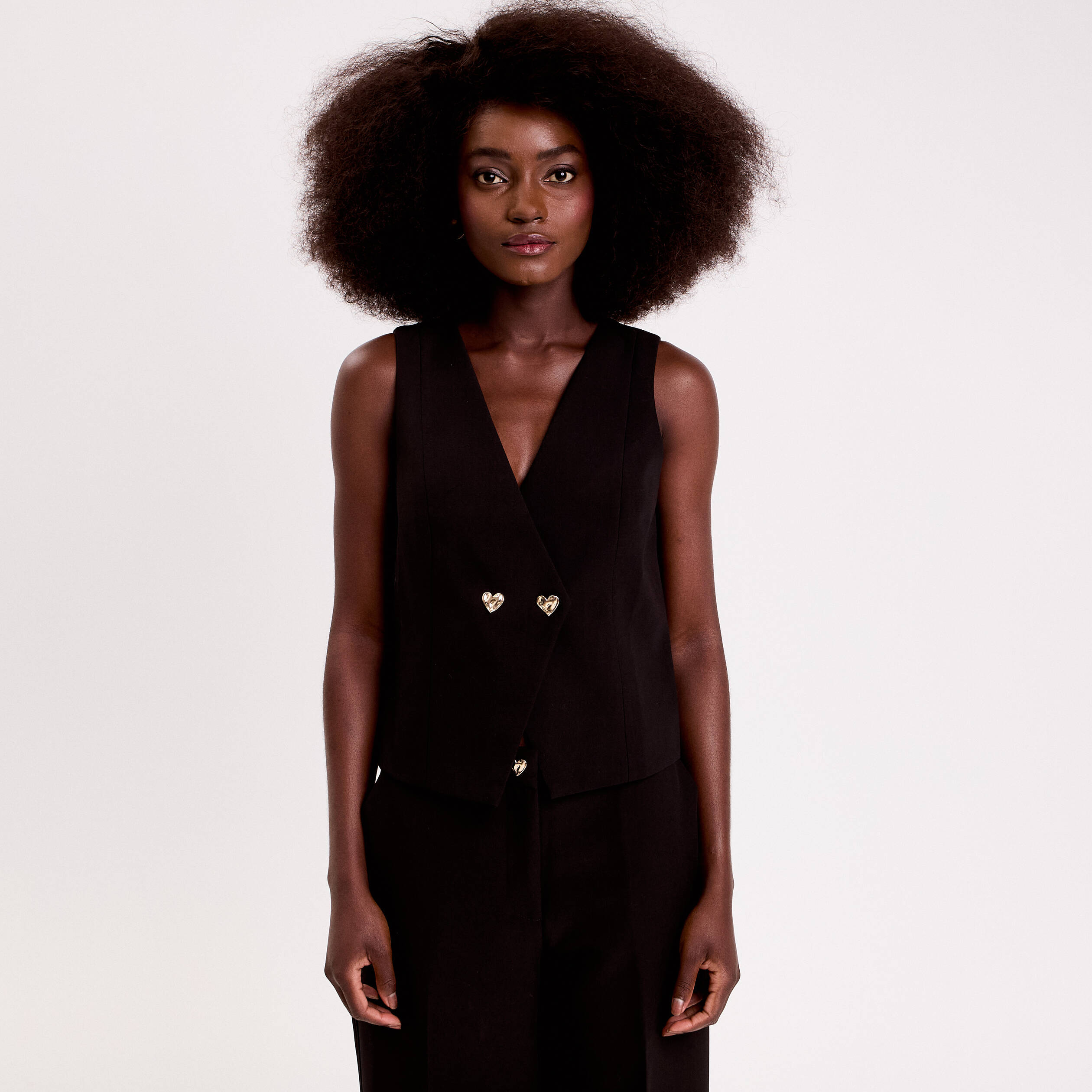 Gilet sans manches boutons coeur noir femme