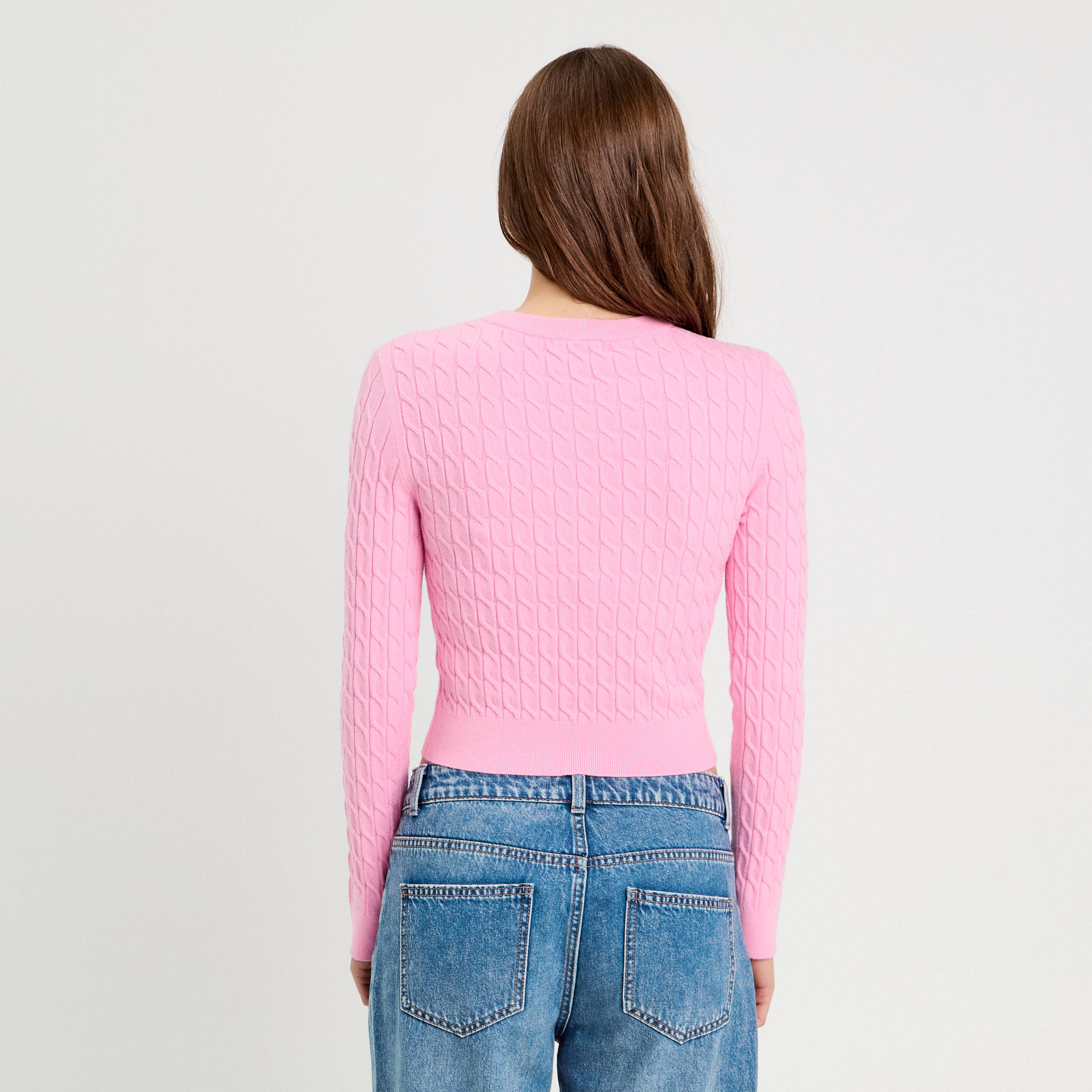 Pull torsades rose femme