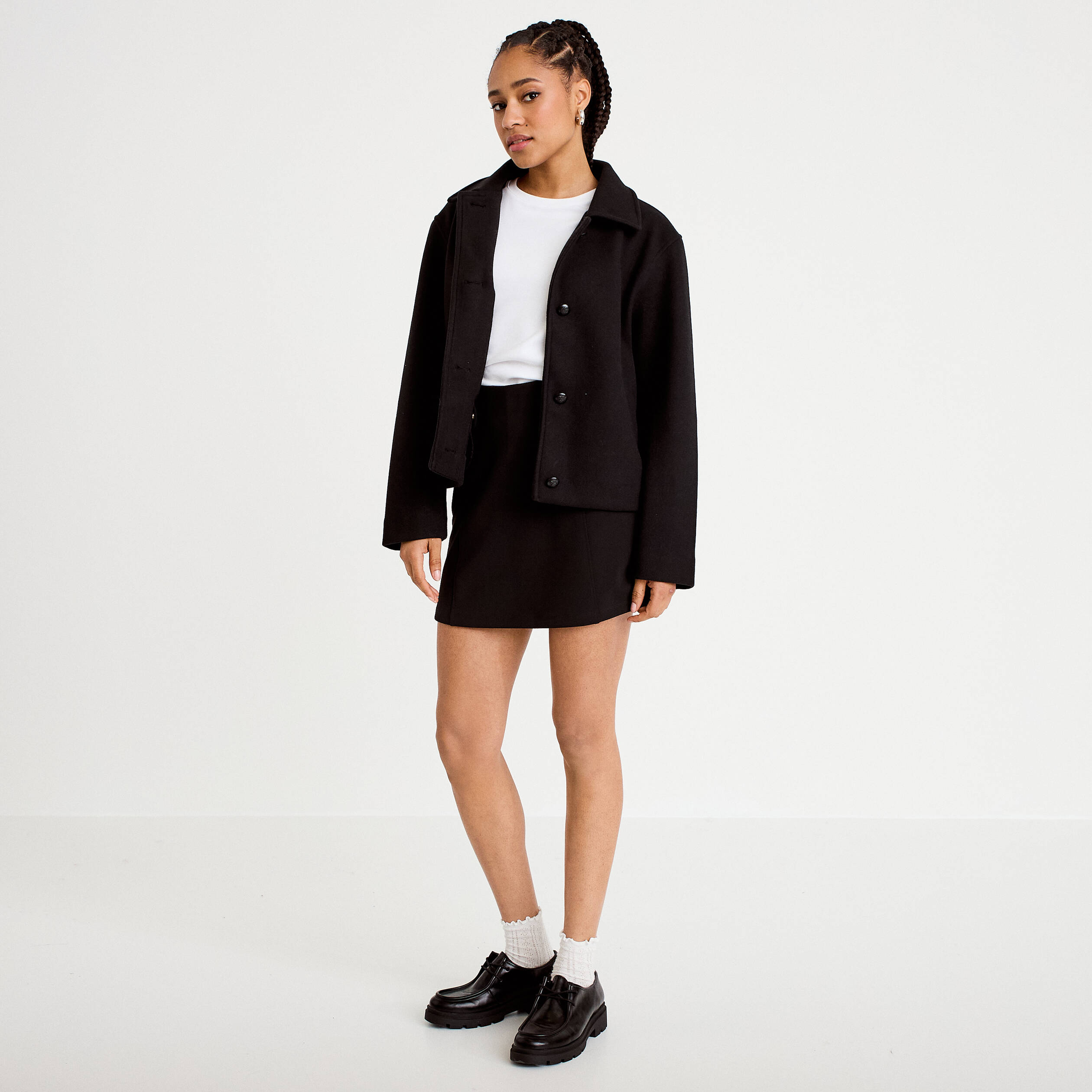 Jupe-short en maille avec boutons noir femme