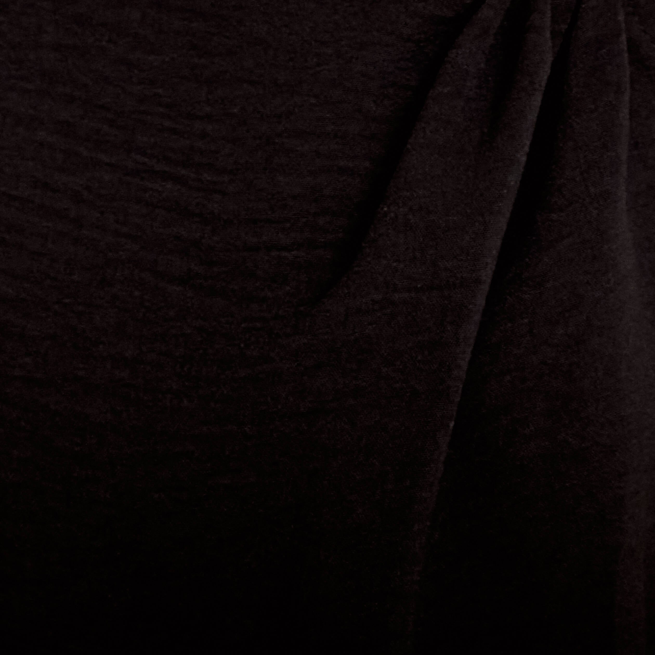Combinaison large sans manches col rond noir femme