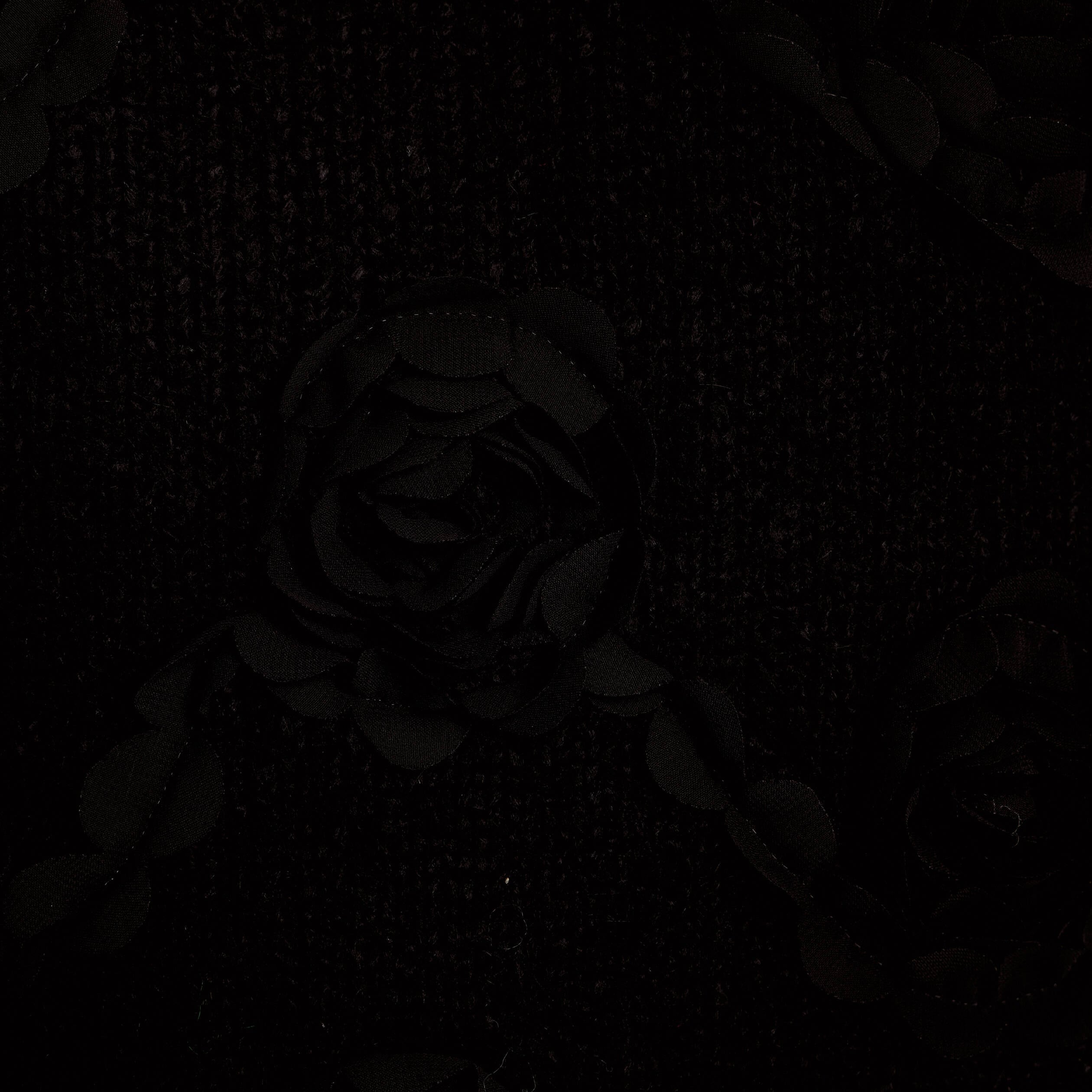 Pull fleurs en relief noir femme