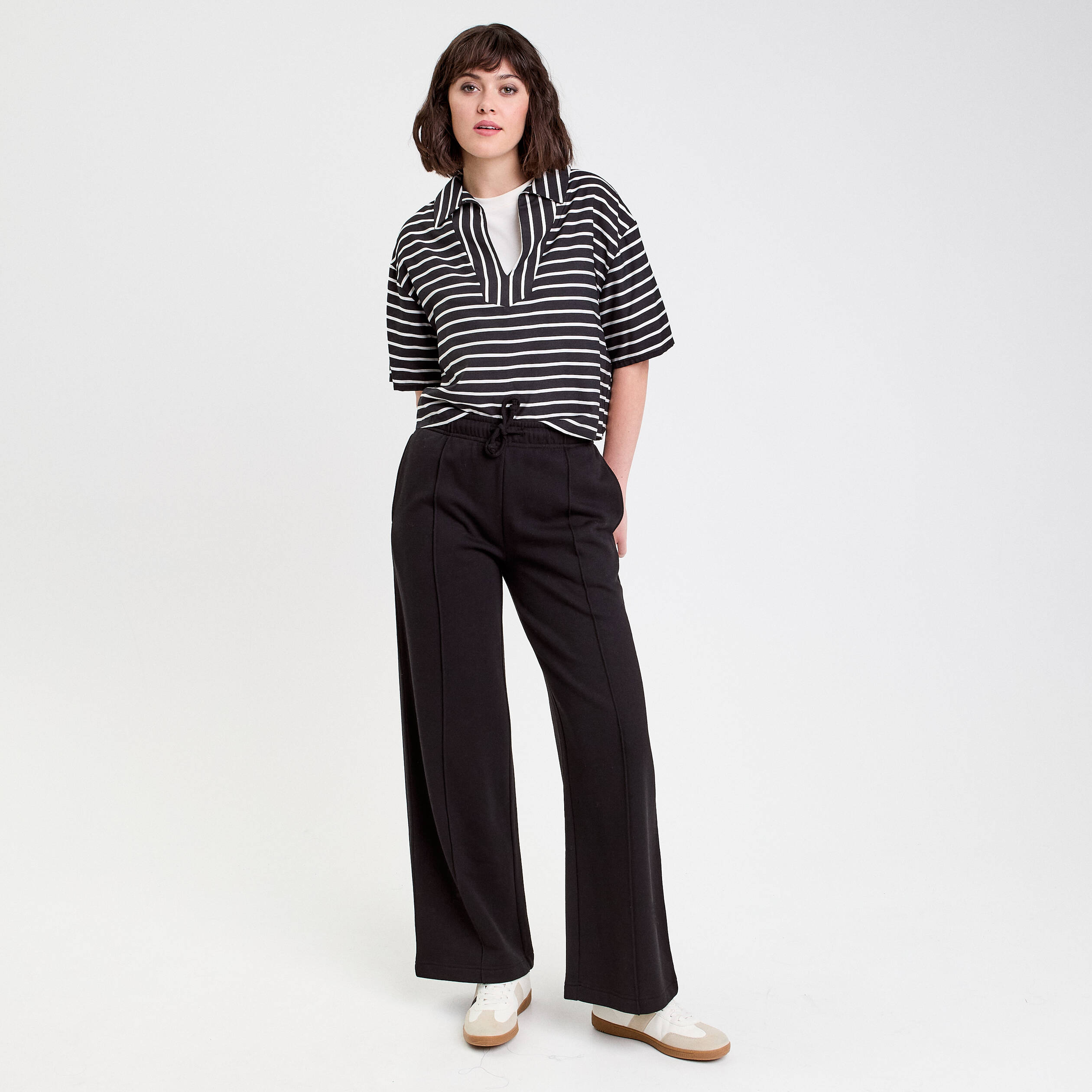 Pantalon large style jogging noir femme