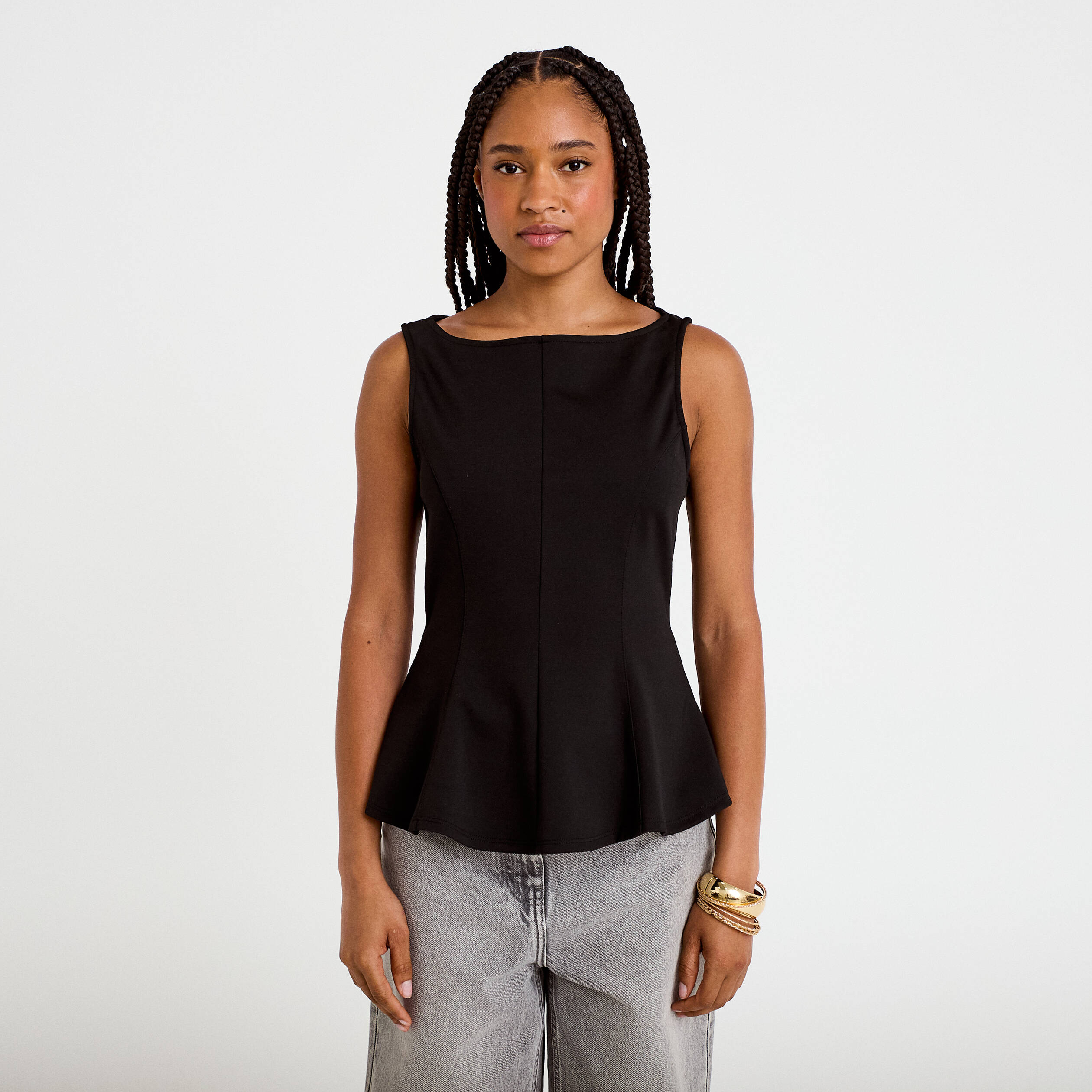 Top p&eacute;plum sans manches col rond noir femme