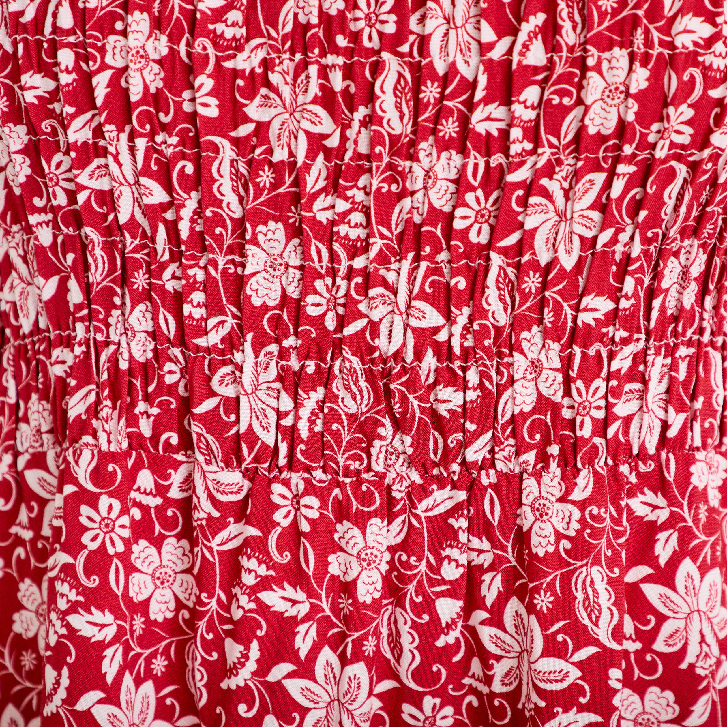 Robe longue &eacute;vas&eacute;e smock&eacute;e rouge femme