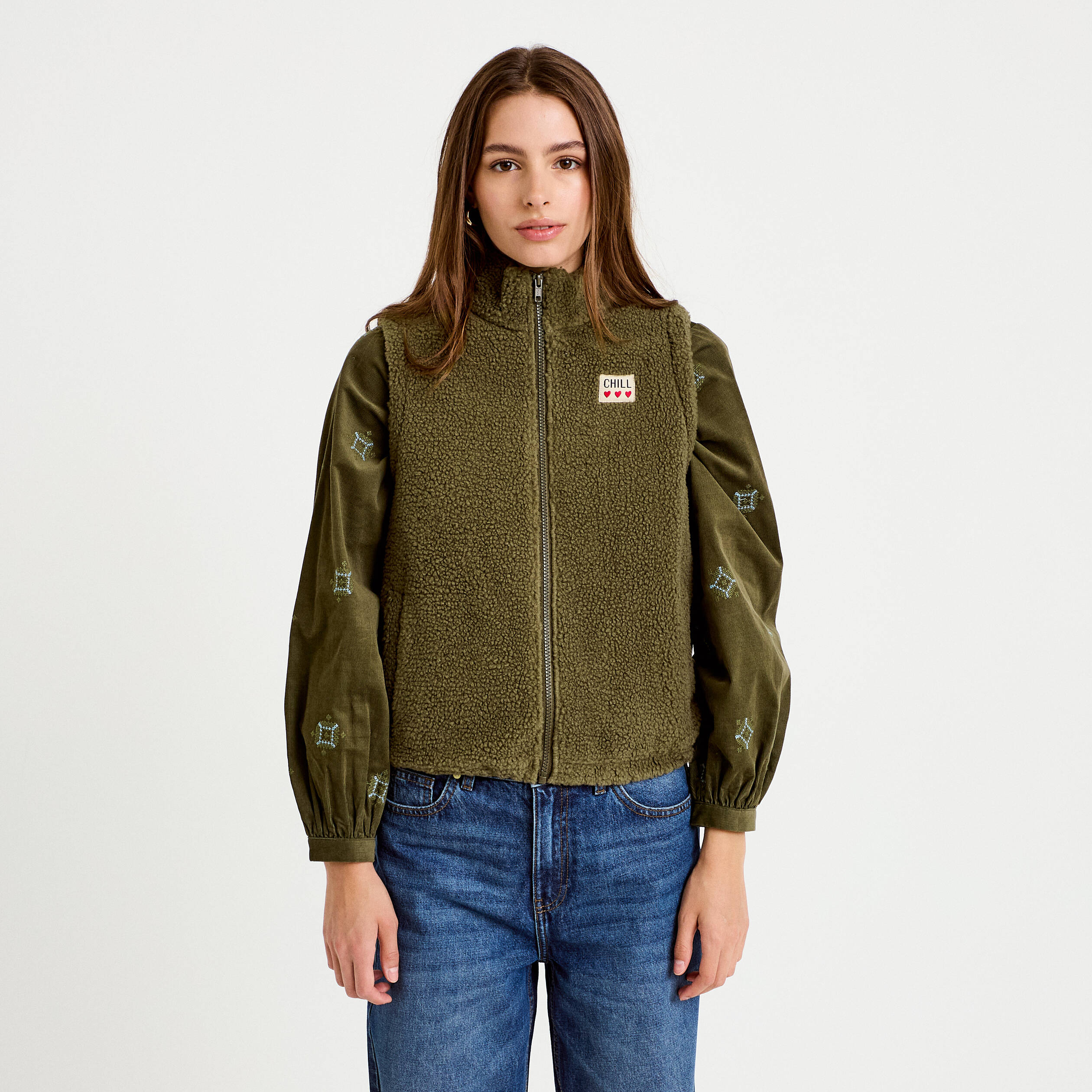 Veste sans manches col montant bouclette vert kaki femme