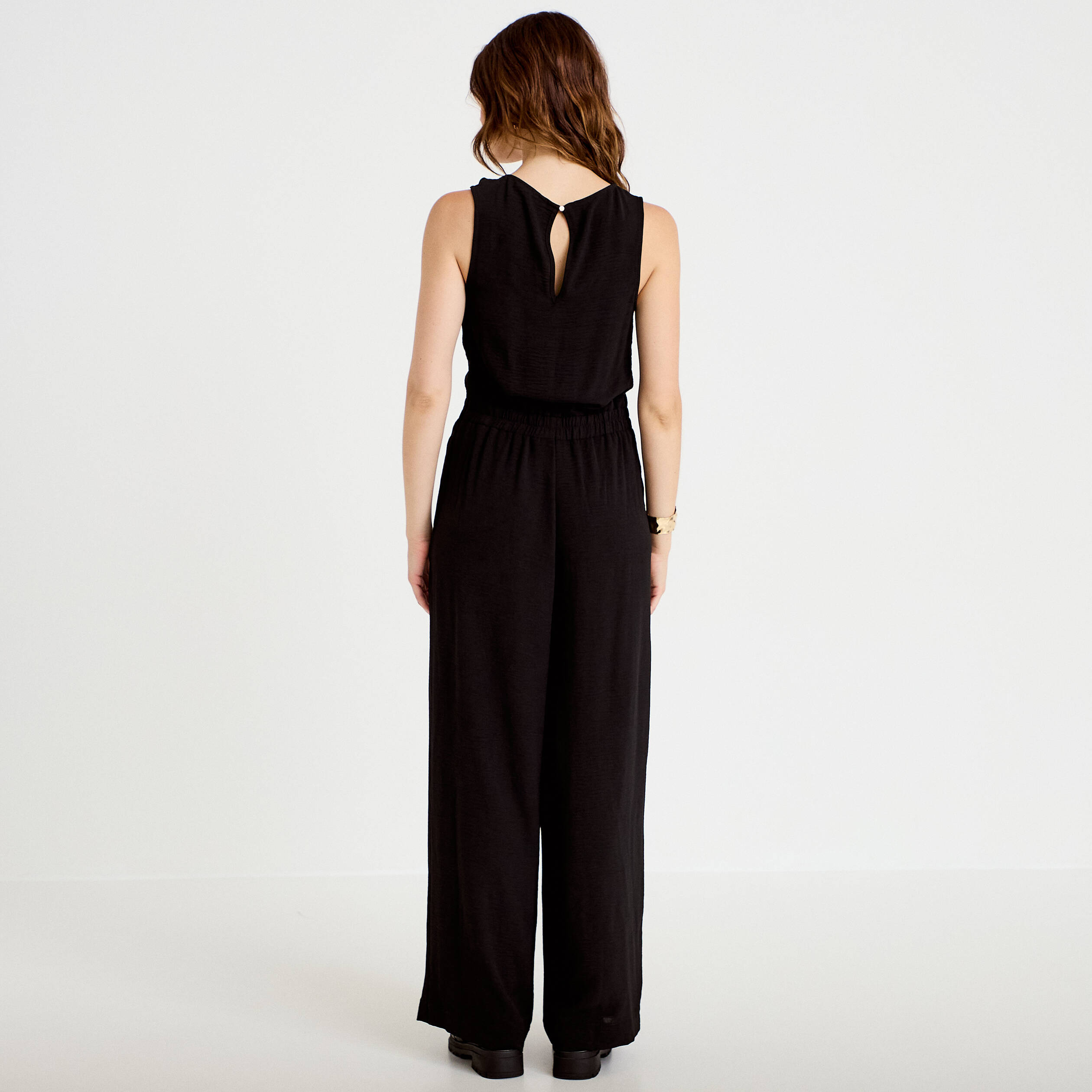 Combinaison large sans manches col rond noir femme