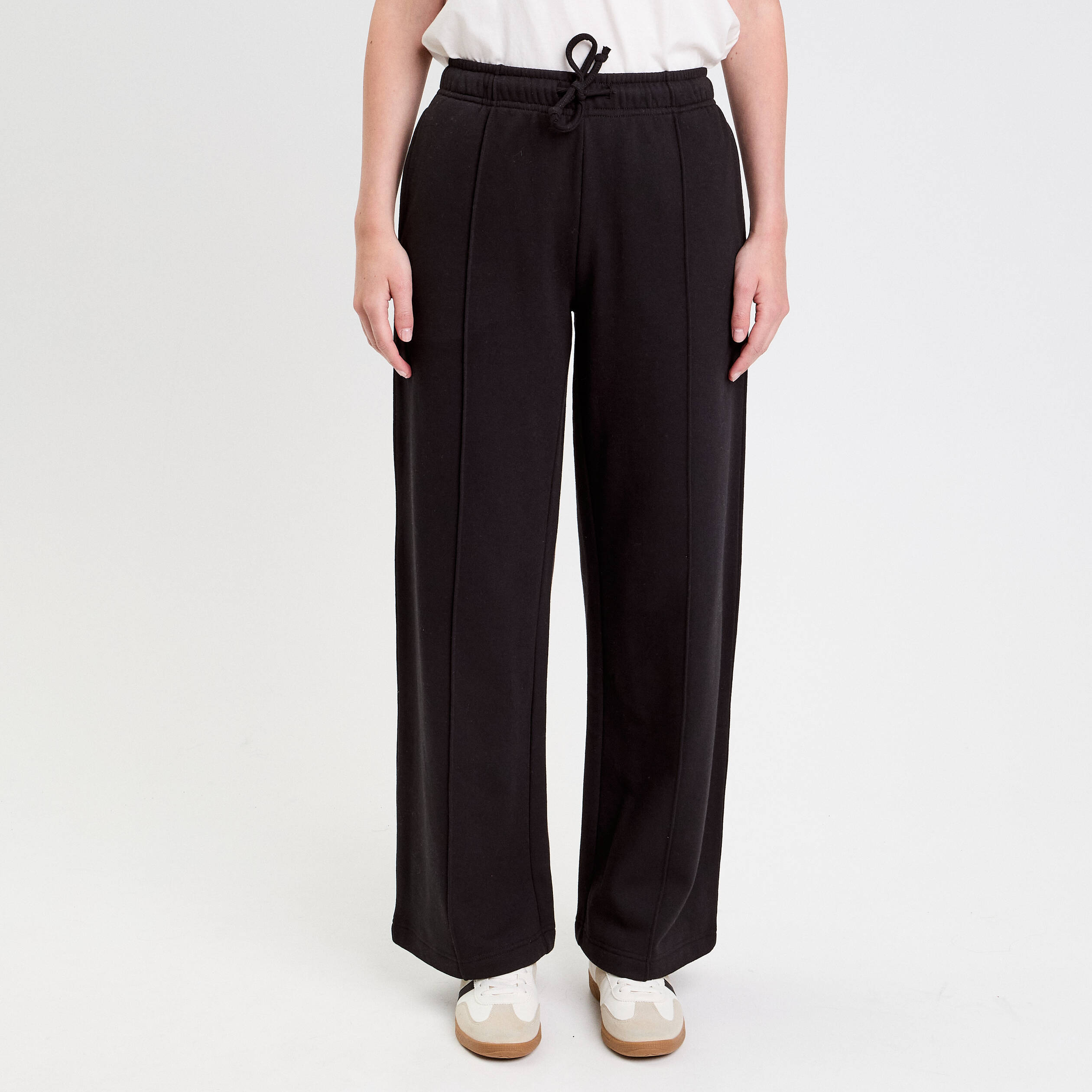 Pantalon large style jogging noir femme