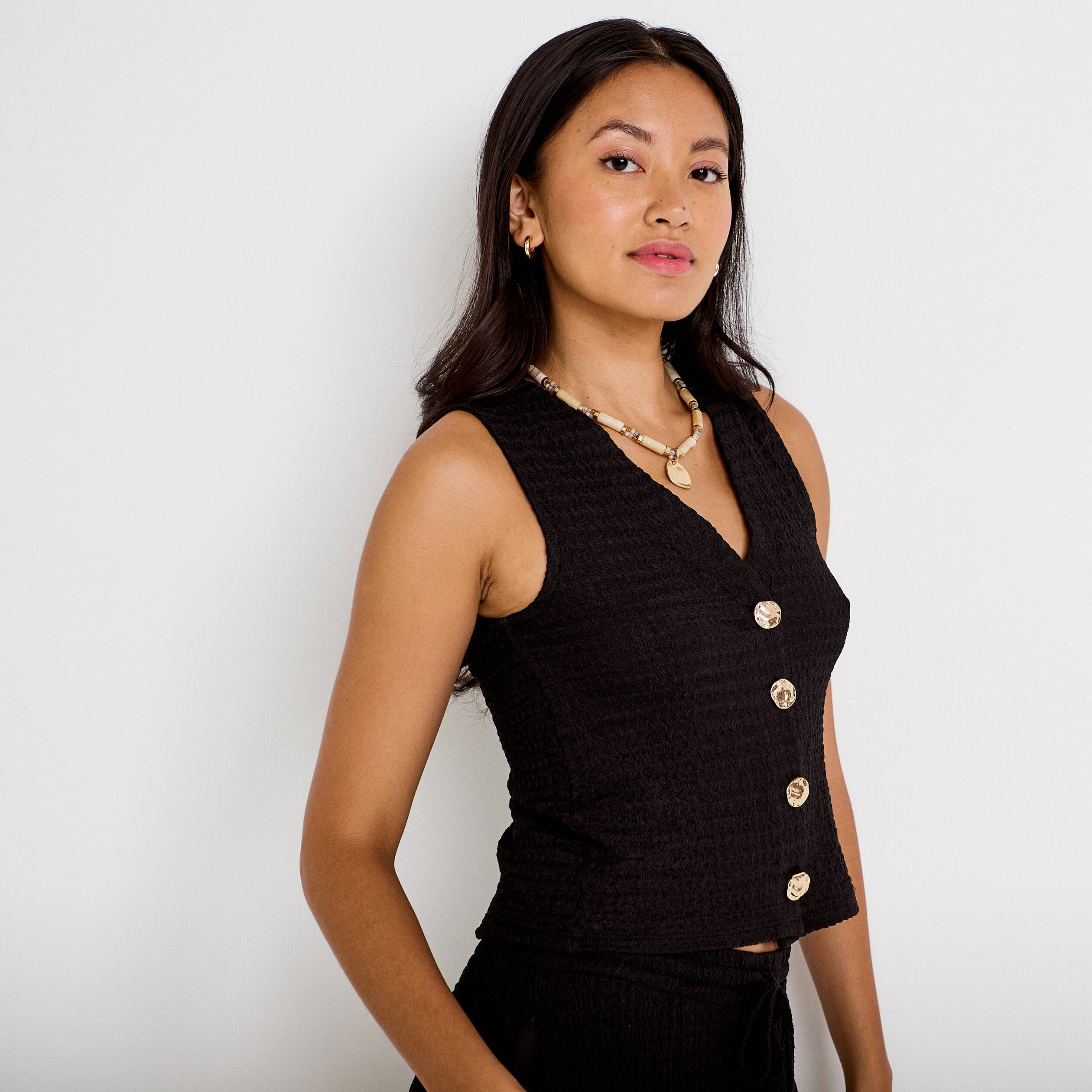 Gilet cintr&eacute; sans manches col v noir femme