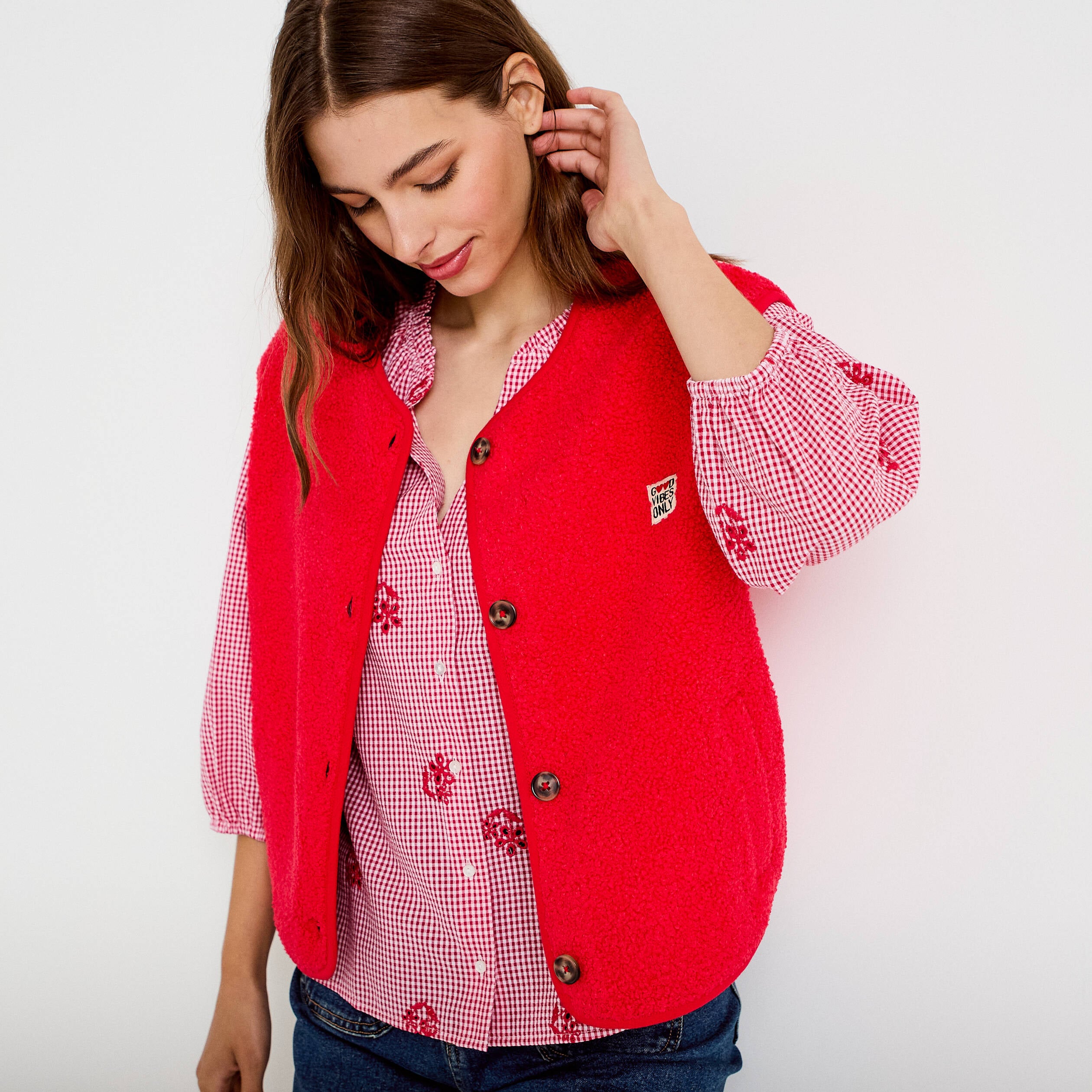 Veste sans manches fausse fourrure rouge femme