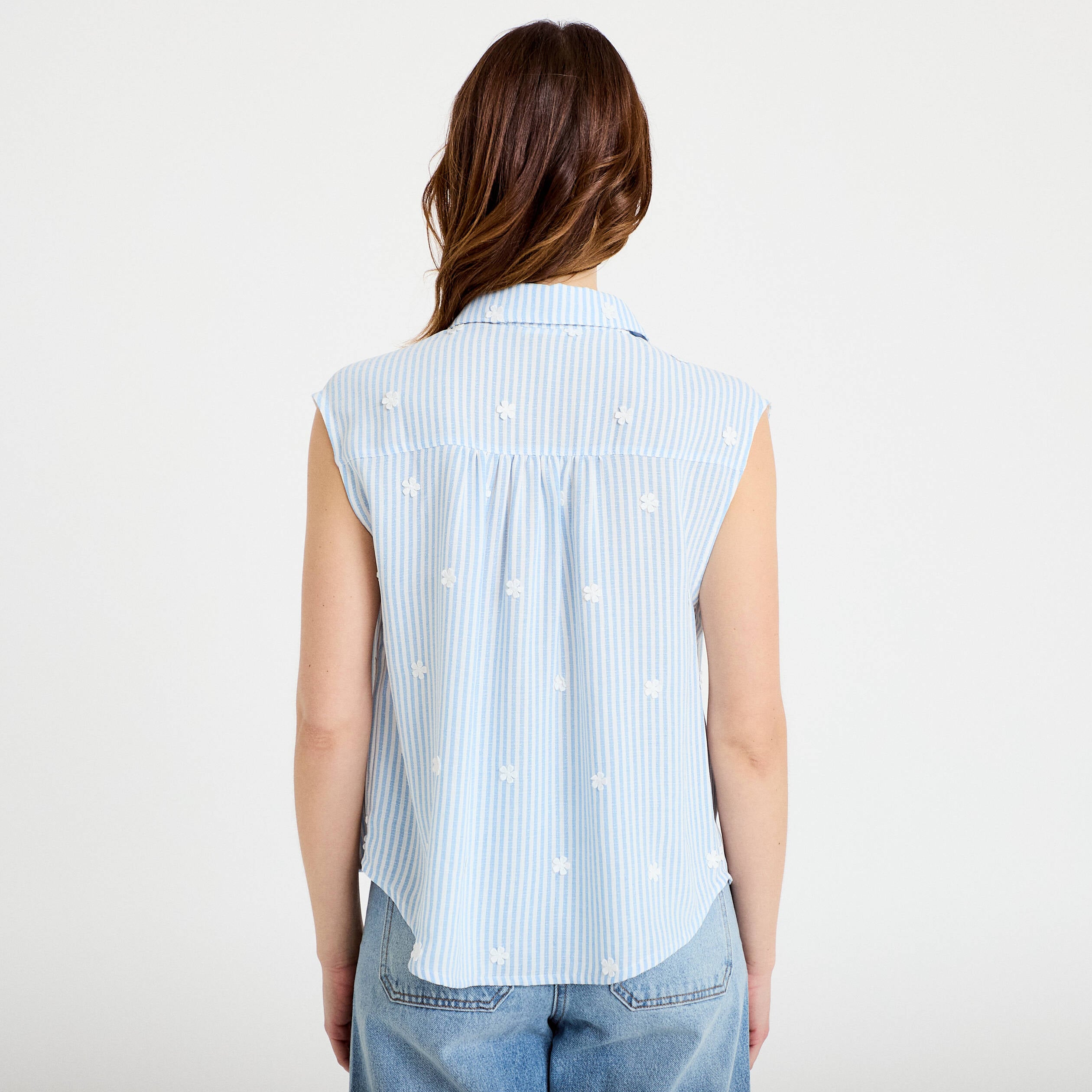 Blouse sans manches col classique bleu femme