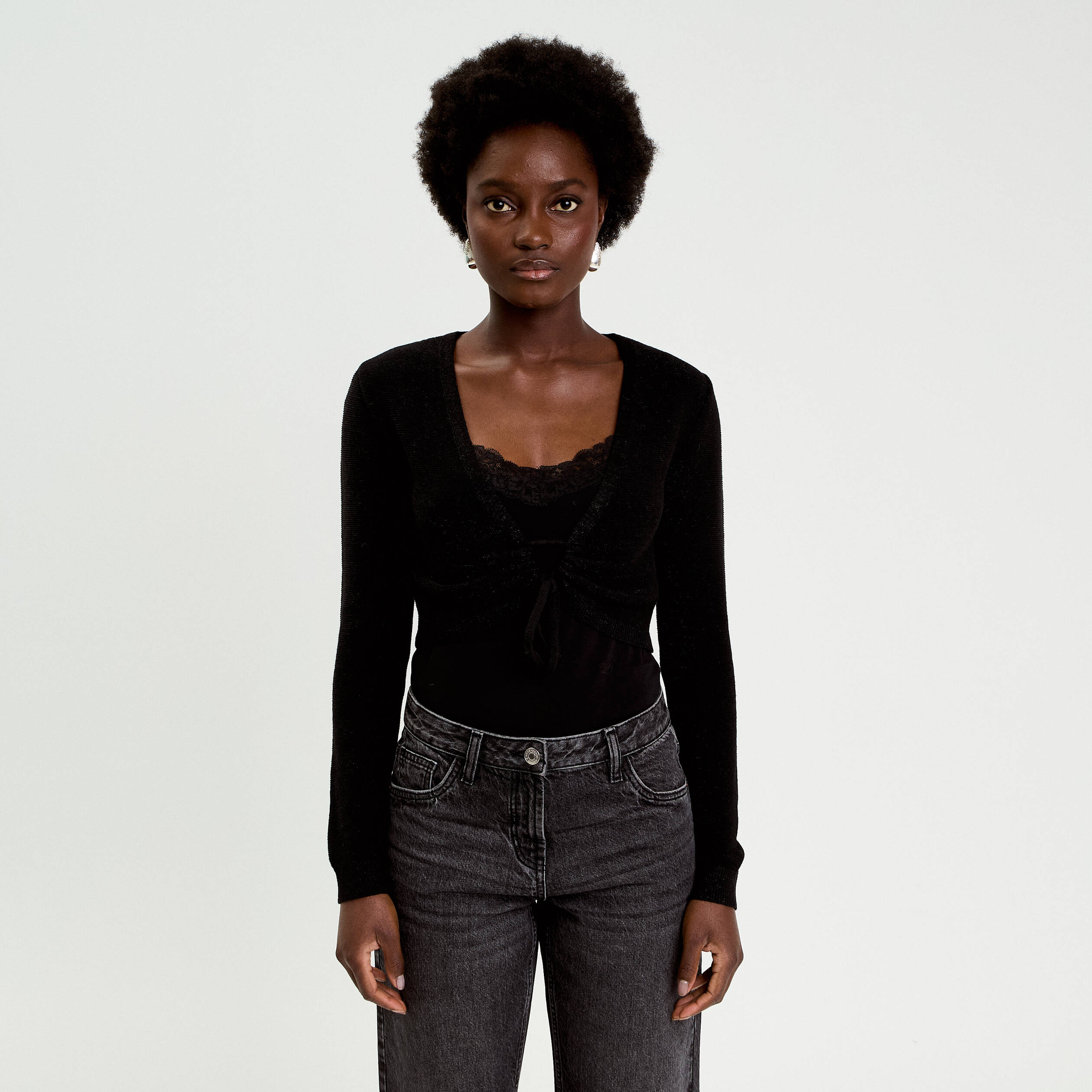 Pull cropped avec noeud noir femme