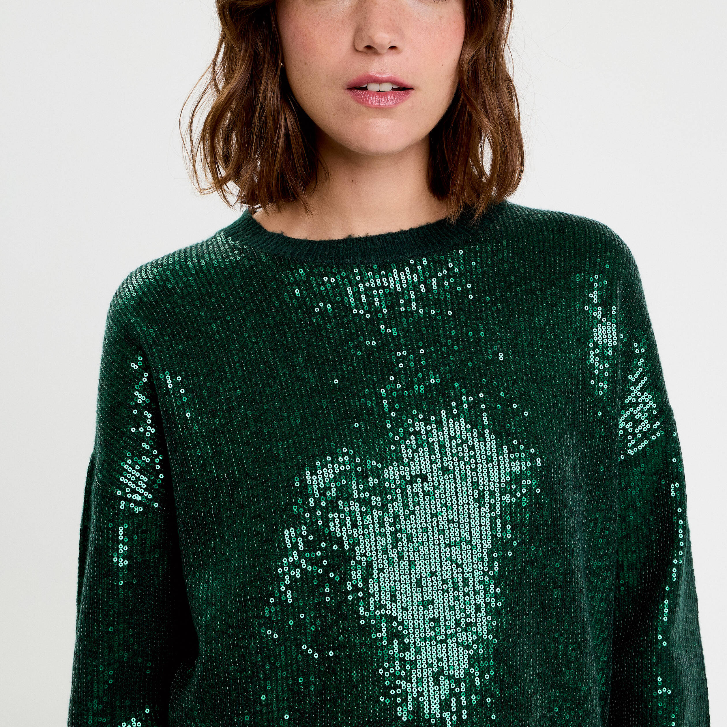 Pull manches longues avec sequins vert fonc&eacute; femme