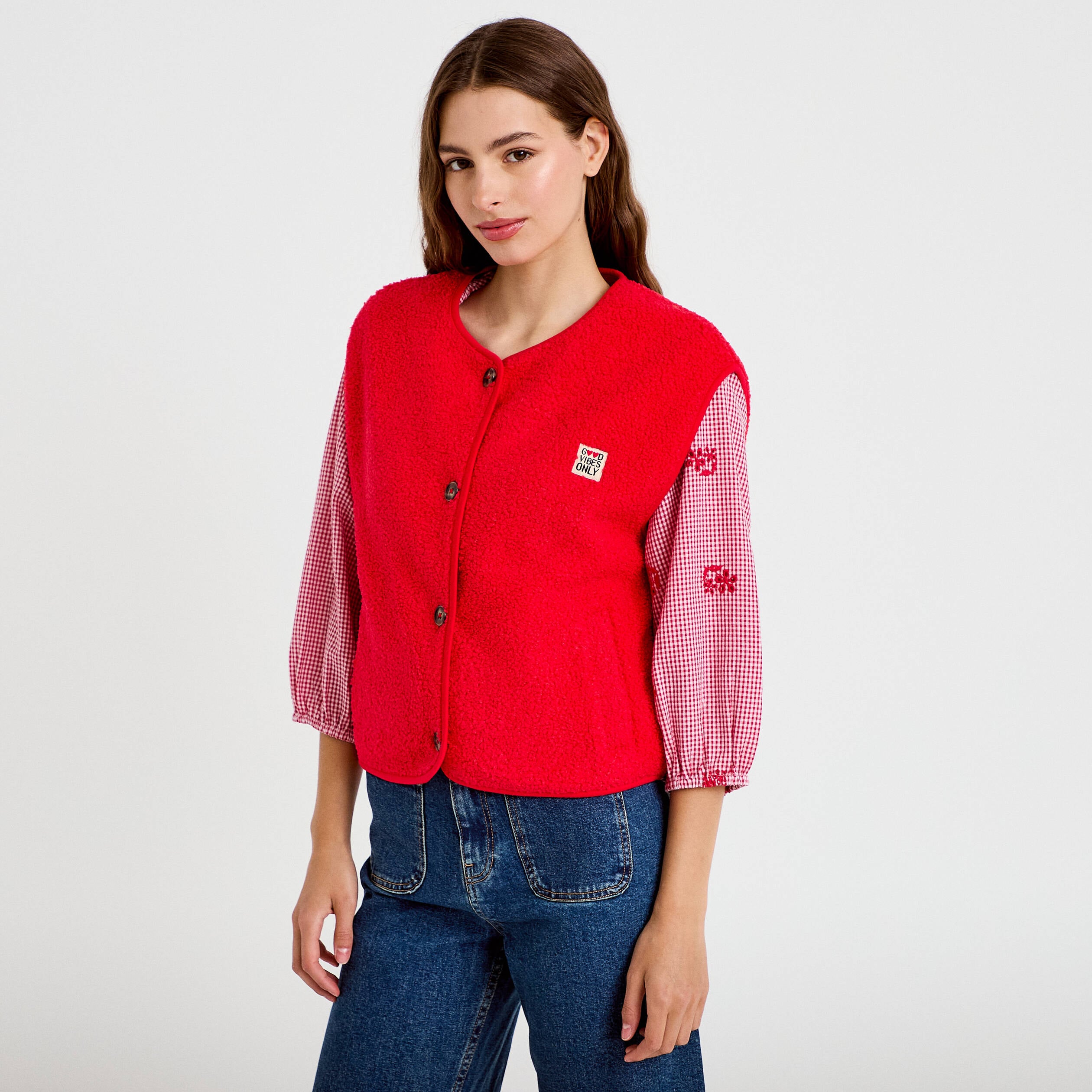 Veste sans manches fausse fourrure rouge femme