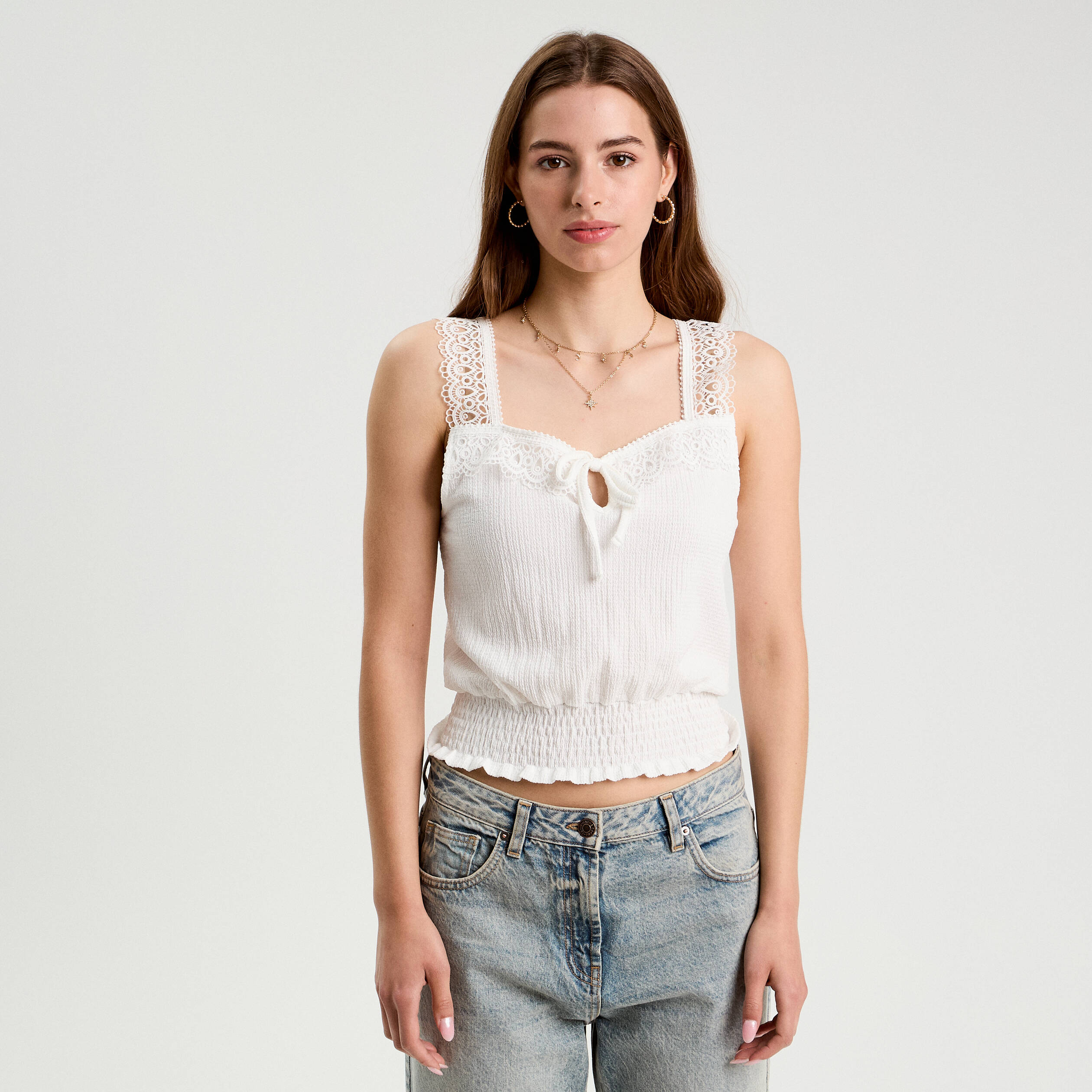 D&eacute;bardeur sans manches ecru femme
