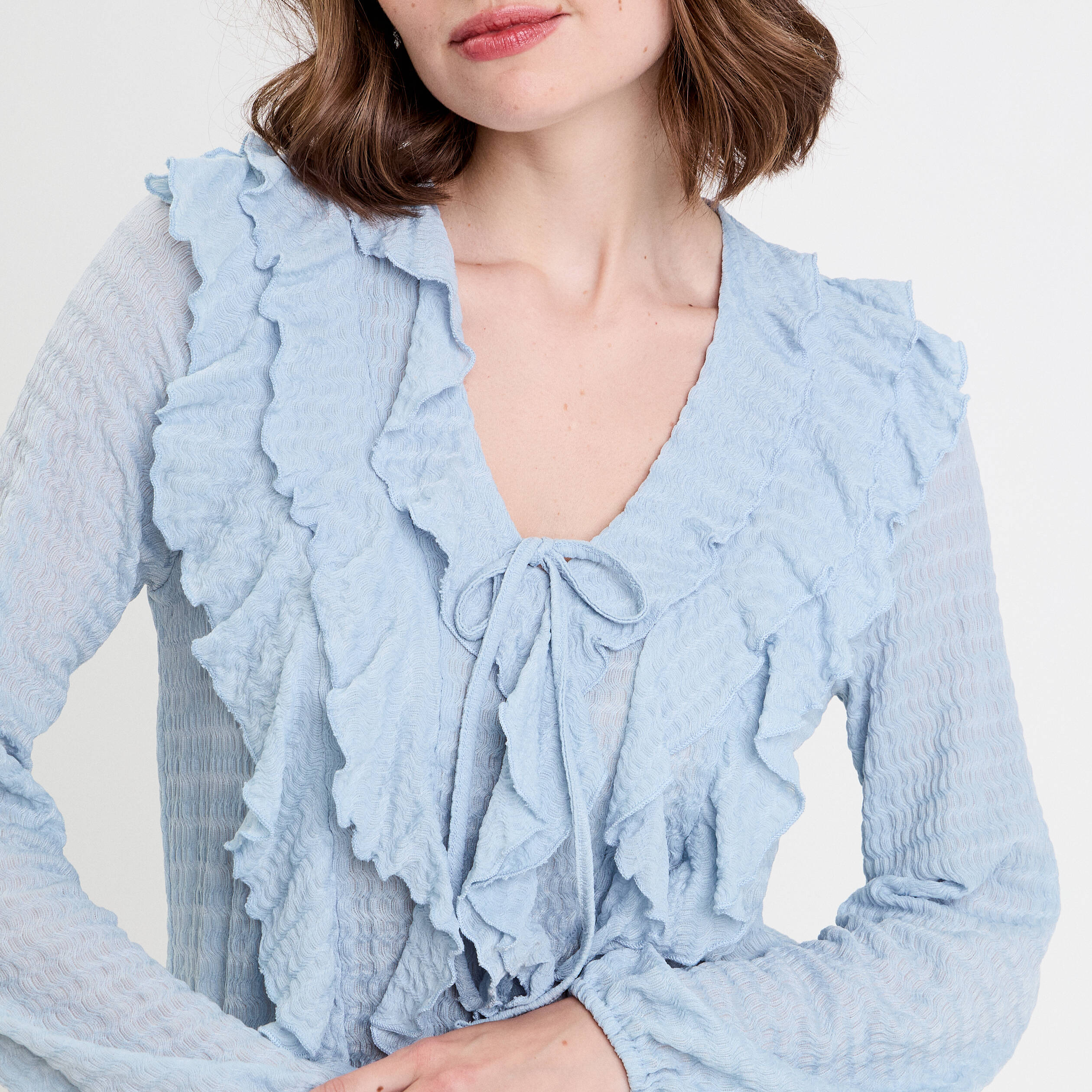 Blouse manches longues aspect dentelle bleu clair femme