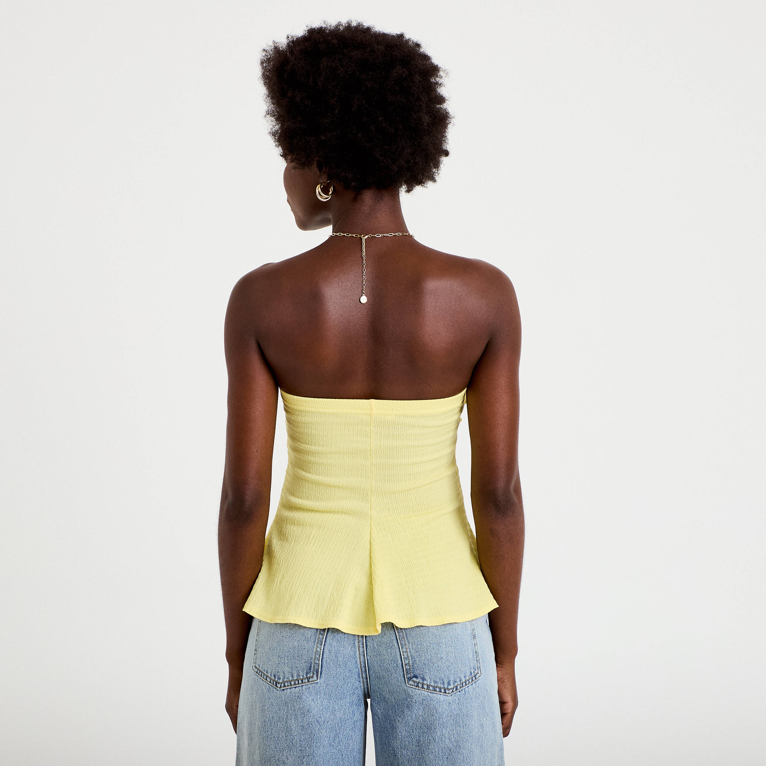 Bustier p&eacute;plum ajust&eacute; cropped pliss&eacute; jaune pastel femme