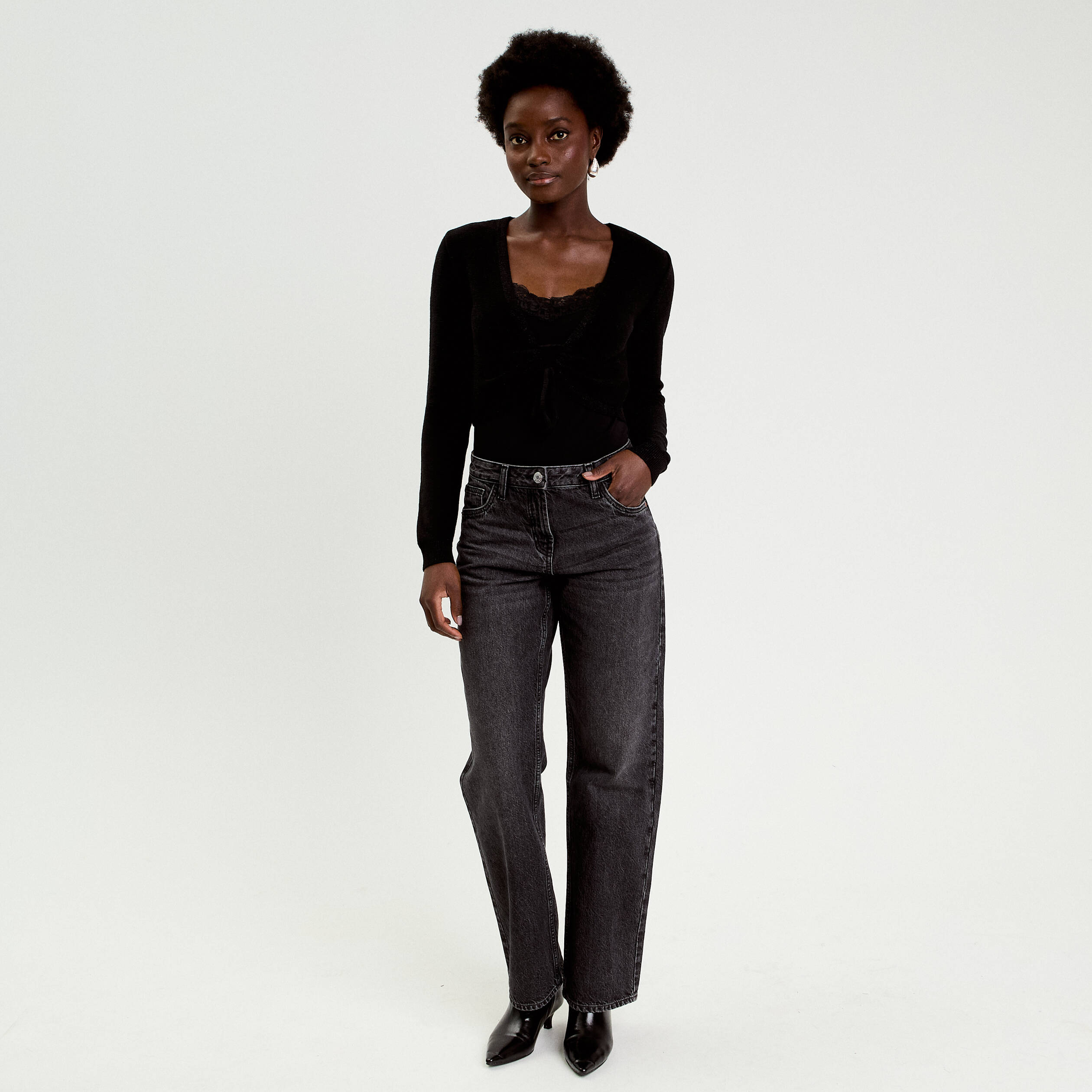 Pull cropped avec noeud noir femme