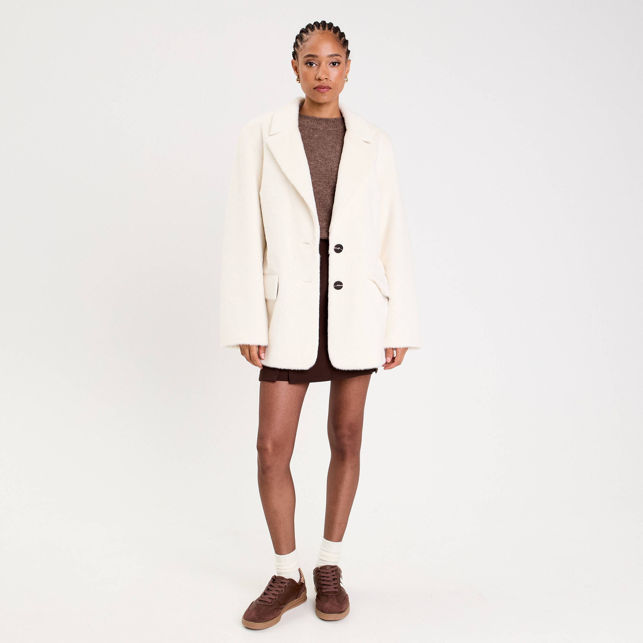 Veste femme en fausse fourrure ivoire à col large
