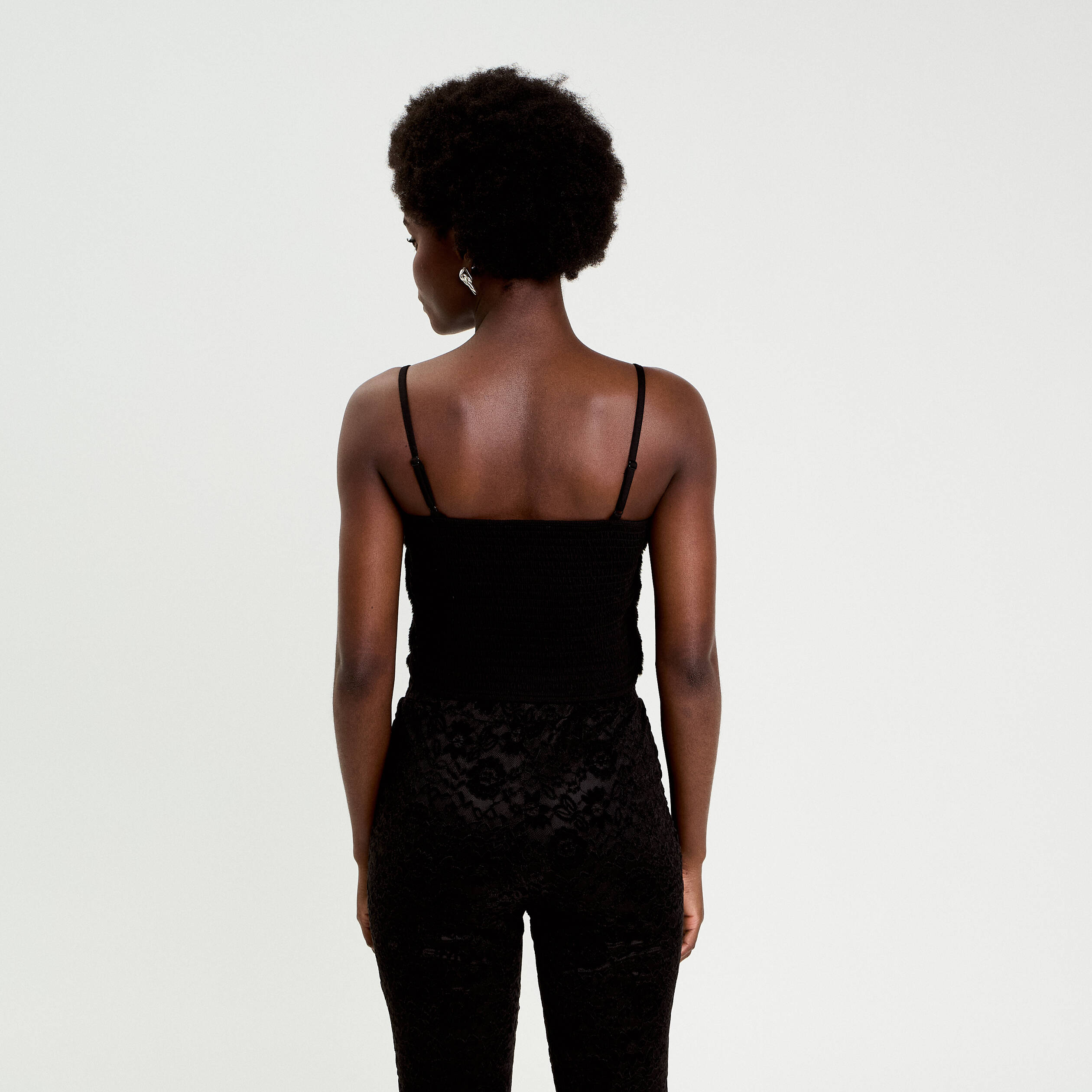 D&eacute;bardeur fausse fourrure noir femme
